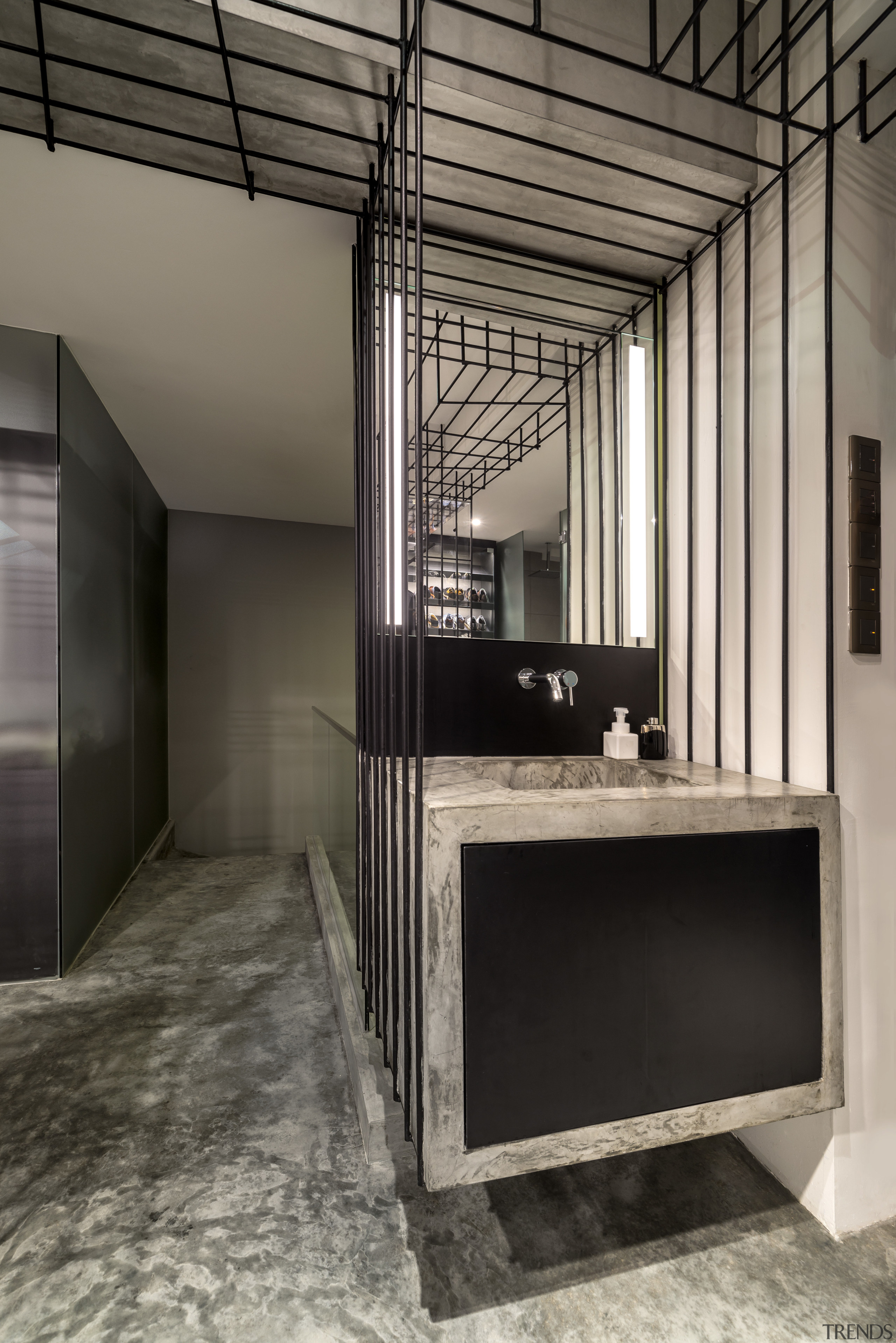 Steel framework appears to support this floating vanity architecture, ceiling, floor, flooring, interior design, gray, black