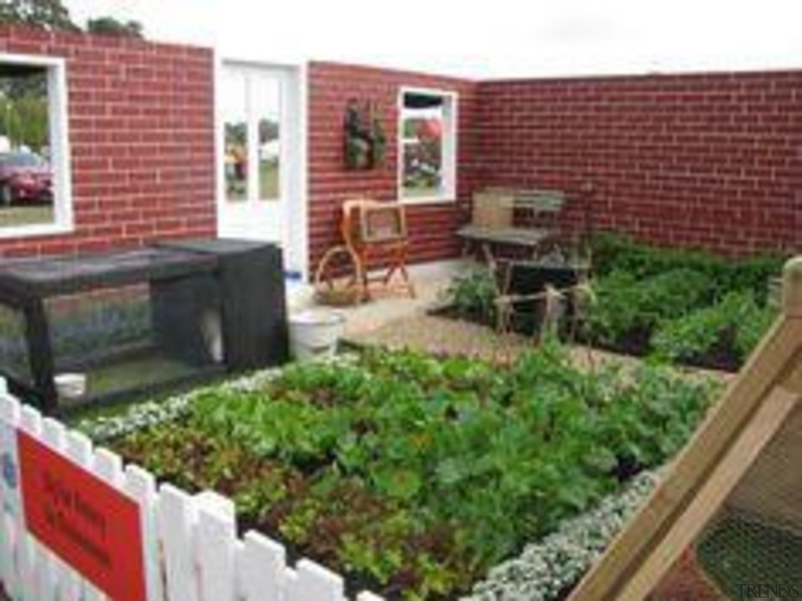 At Ellerslie International Flower Show - At Ellerslie backyard, courtyard, garden, herb, home, landscaping, outdoor structure, plant, property, real estate, roof, yard