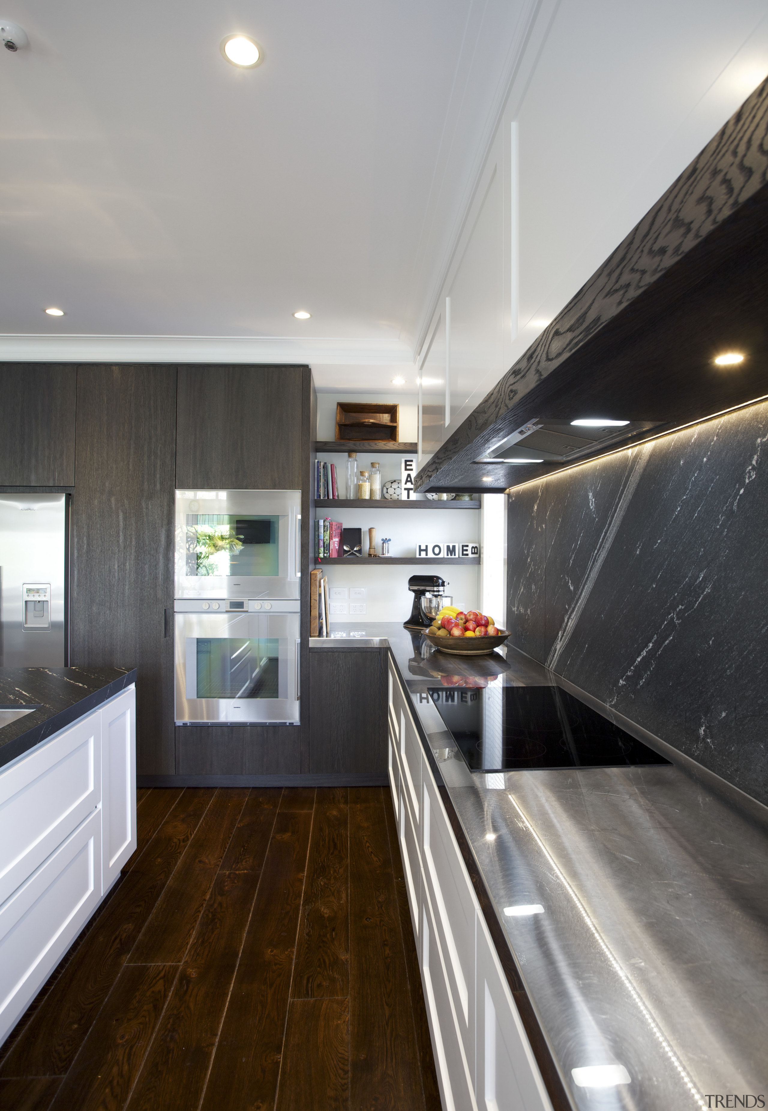 This classic kitchen by Robyn Labb offers modern cabinetry, ceiling, countertop, house, interior design, kitchen, real estate, room, gray