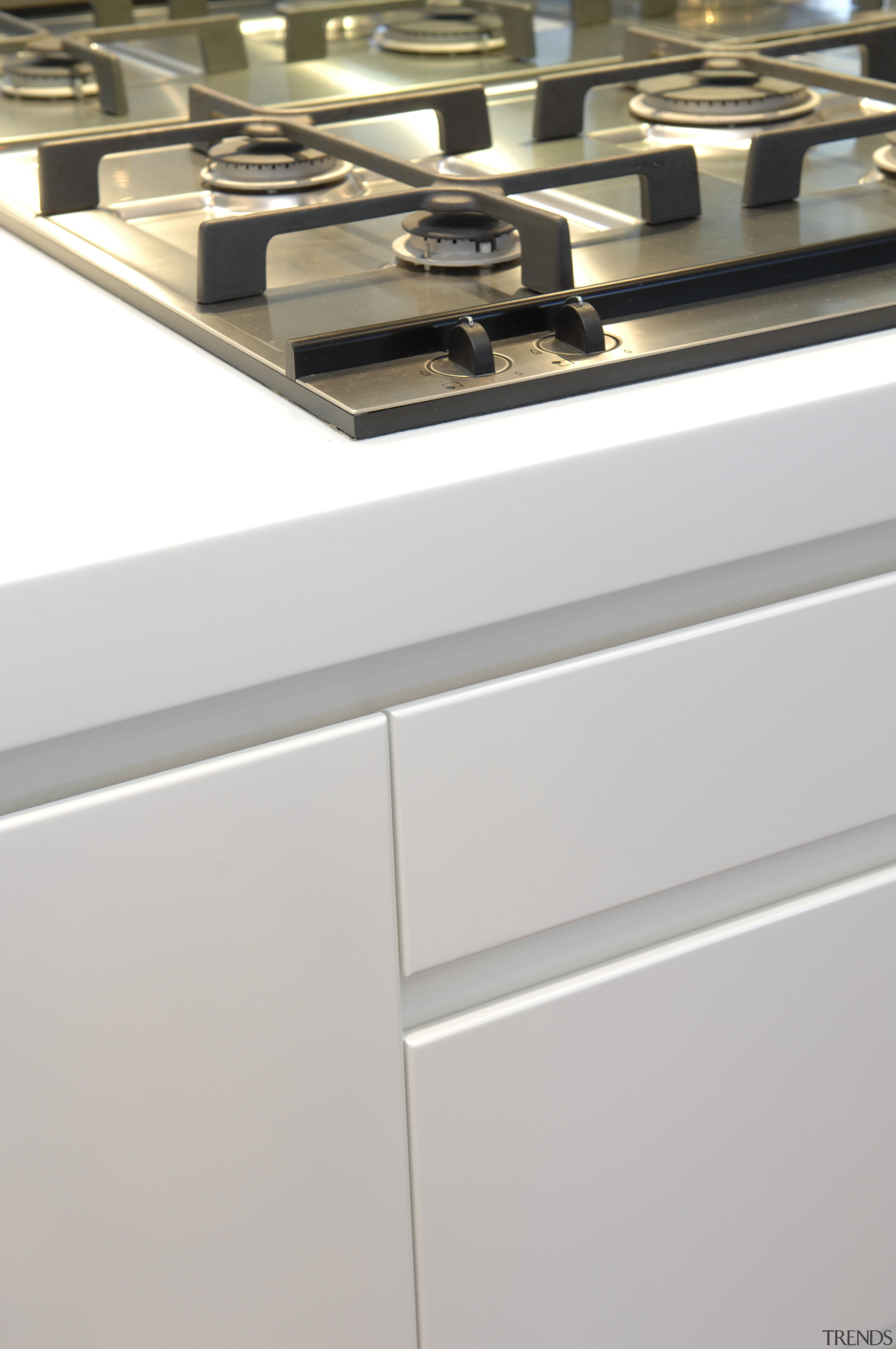 View of a gas cooktop which is part countertop, furniture, product design, gray