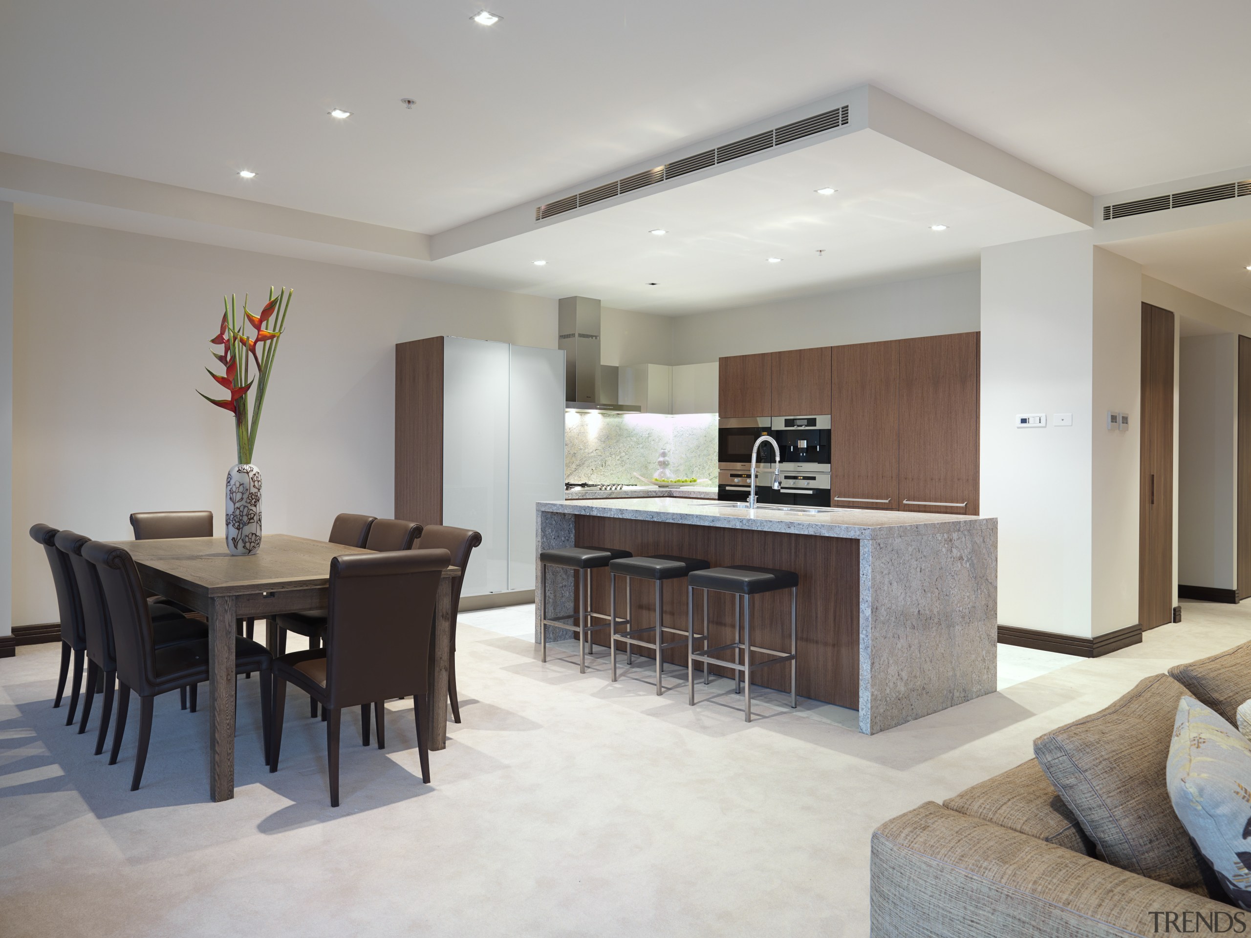 This kitchen in the new Lucient apartments in ceiling, floor, flooring, interior design, kitchen, living room, property, real estate, room, gray