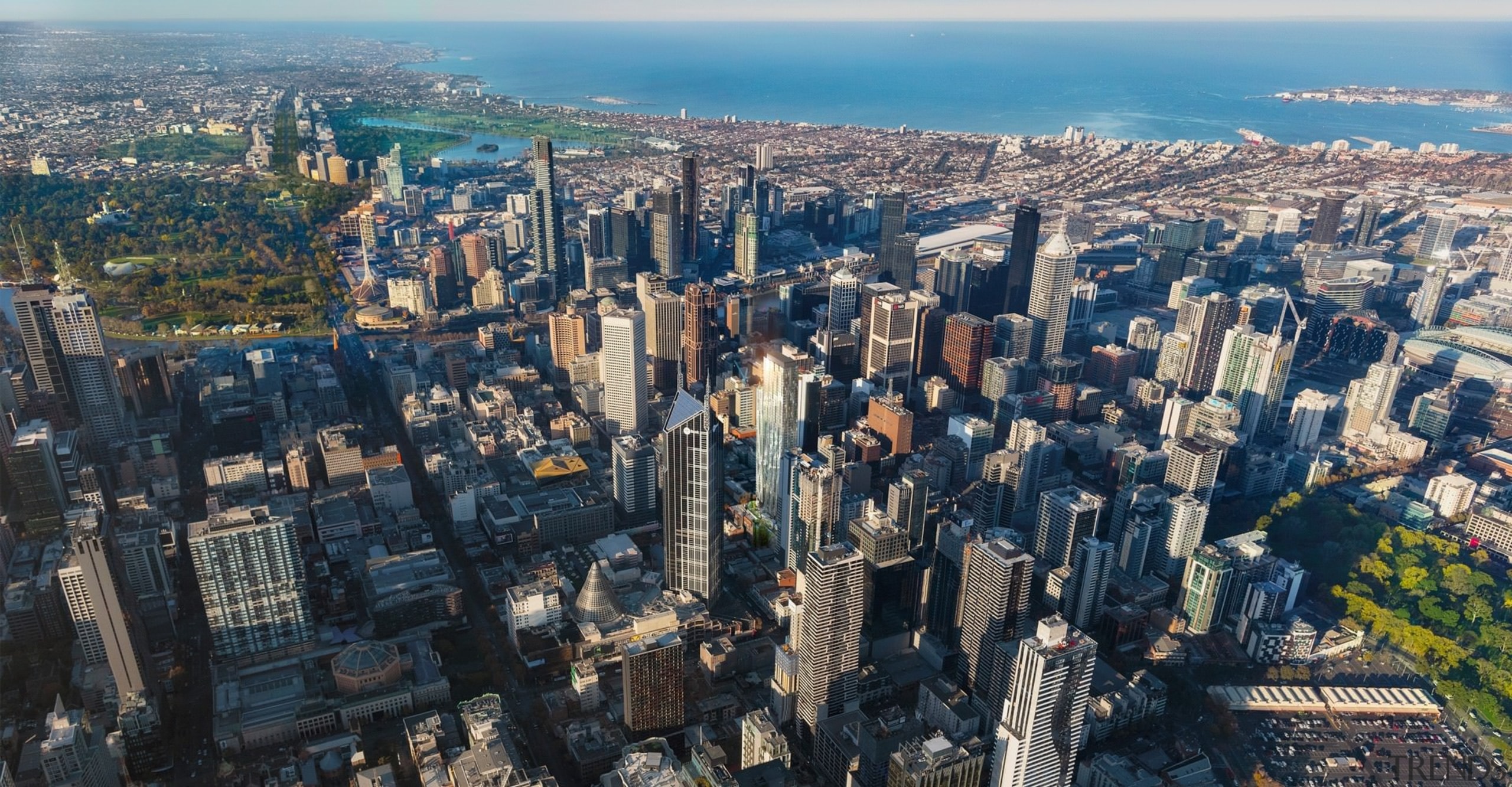 A view of the wider Melbourne skyline - aerial photography, bird's eye view, building, city, cityscape, daytime, downtown, landmark, metropolis, metropolitan area, sky, skyline, skyscraper, suburb, tower block, urban area, black, gray