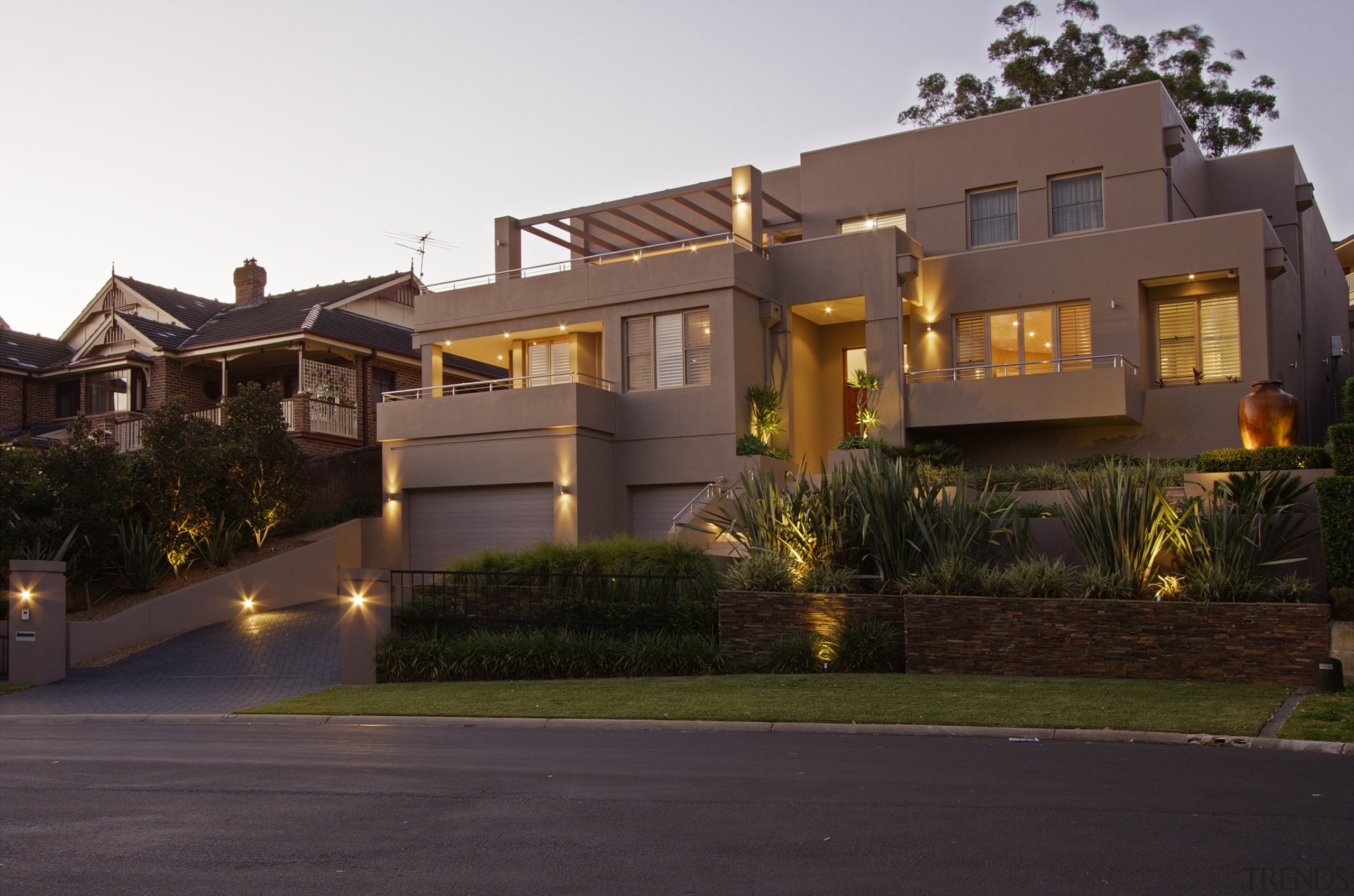 View of this contemporary home by Denton Homes apartment, architecture, building, condominium, elevation, estate, facade, home, house, lighting, mansion, mixed use, neighbourhood, property, real estate, residential area, roof, suburb, window, black, brown