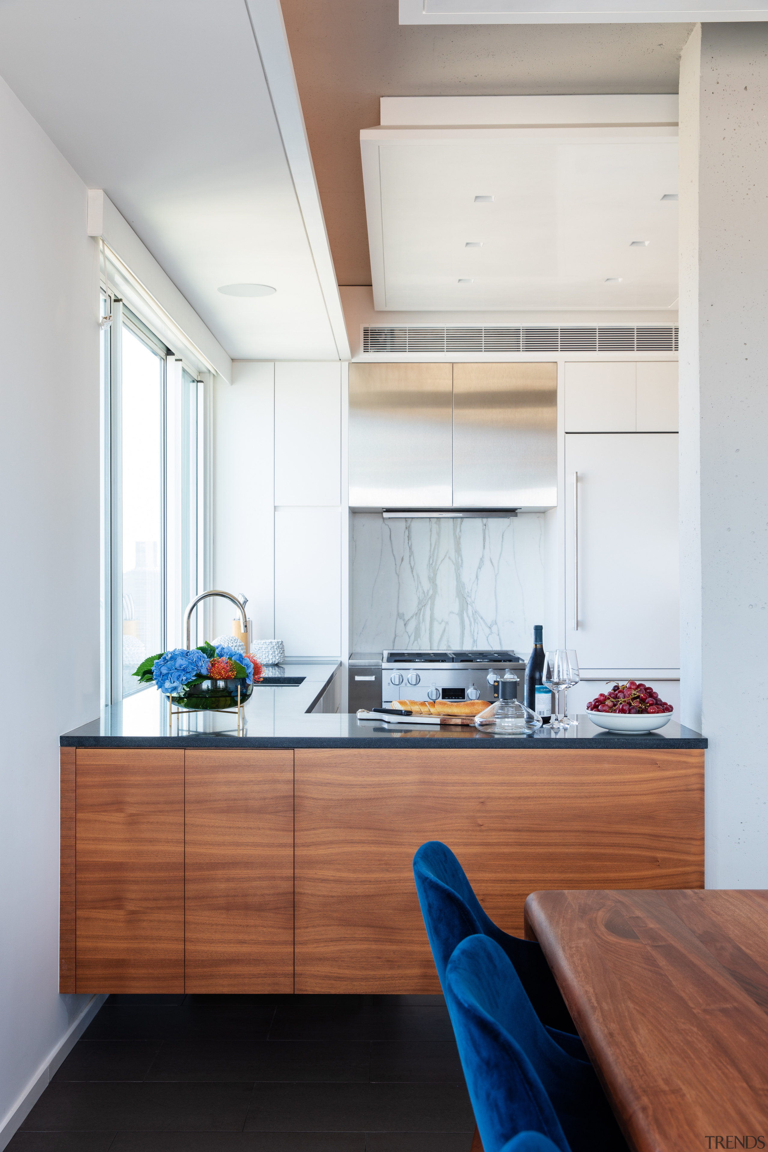 ​​​​​​​The revamped kitchen in this Manhattan penthouse is apartment, penthouse, architecture, cabinetry, countertop, benchtop, cupboards, floor, flooring, home, interior design, kitchen, Andrew wilkinson