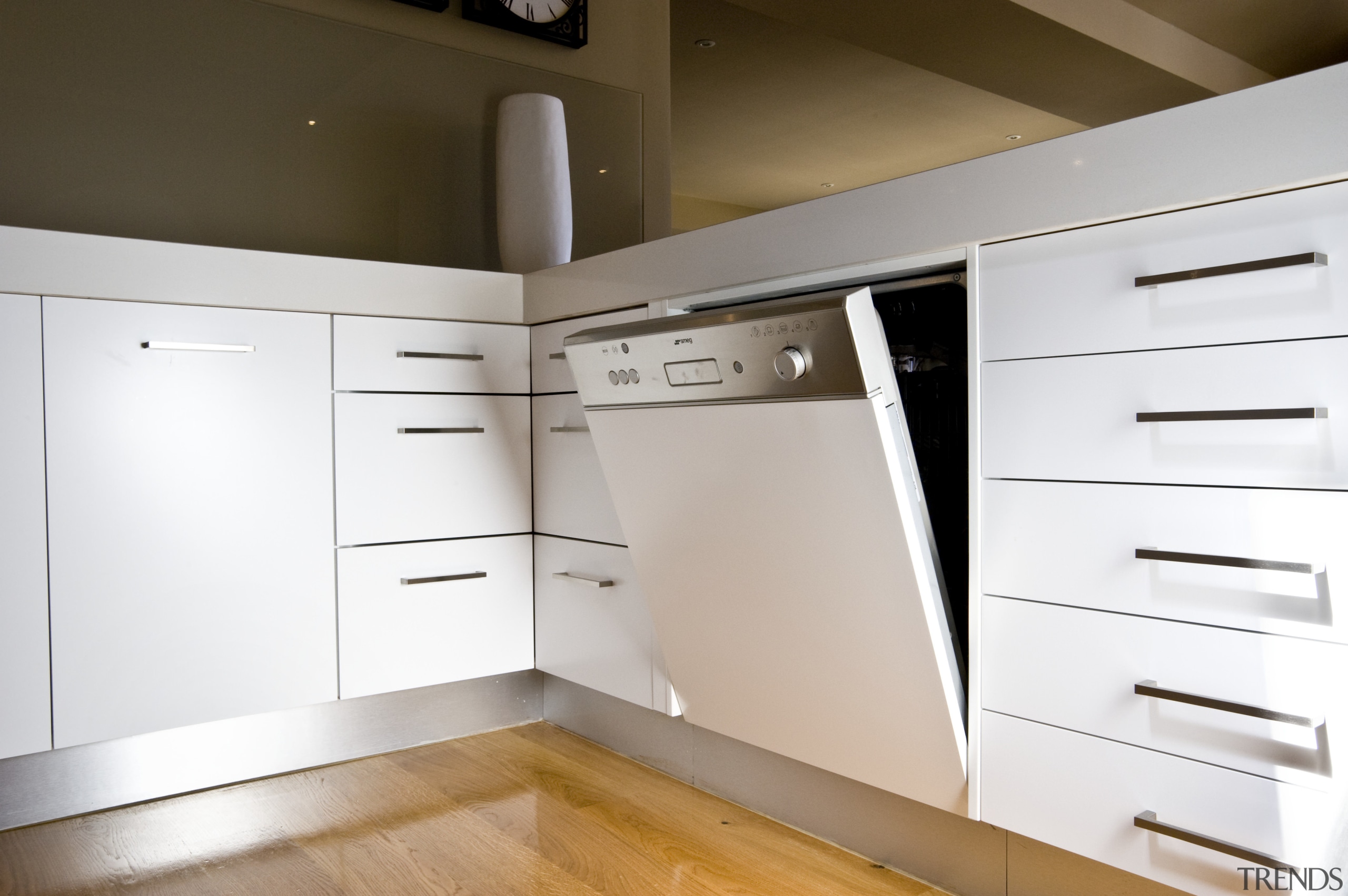 Image of Smeg appliances used in kitchen which cabinetry, countertop, floor, furniture, home appliance, kitchen, product, product design, room, wood, white, brown