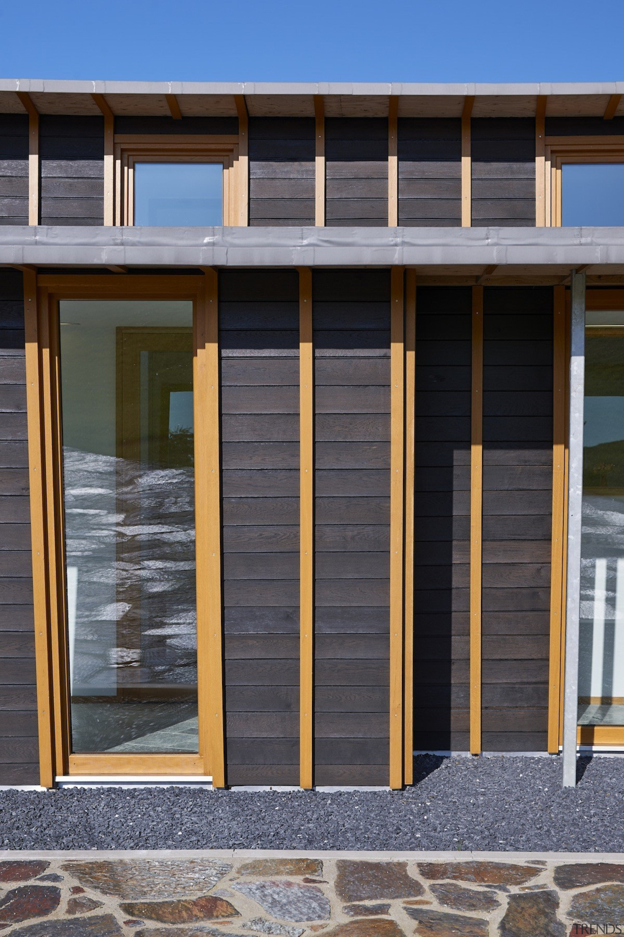 With sustainability and passive design rising high in door, facade, house, siding, window, gray, black