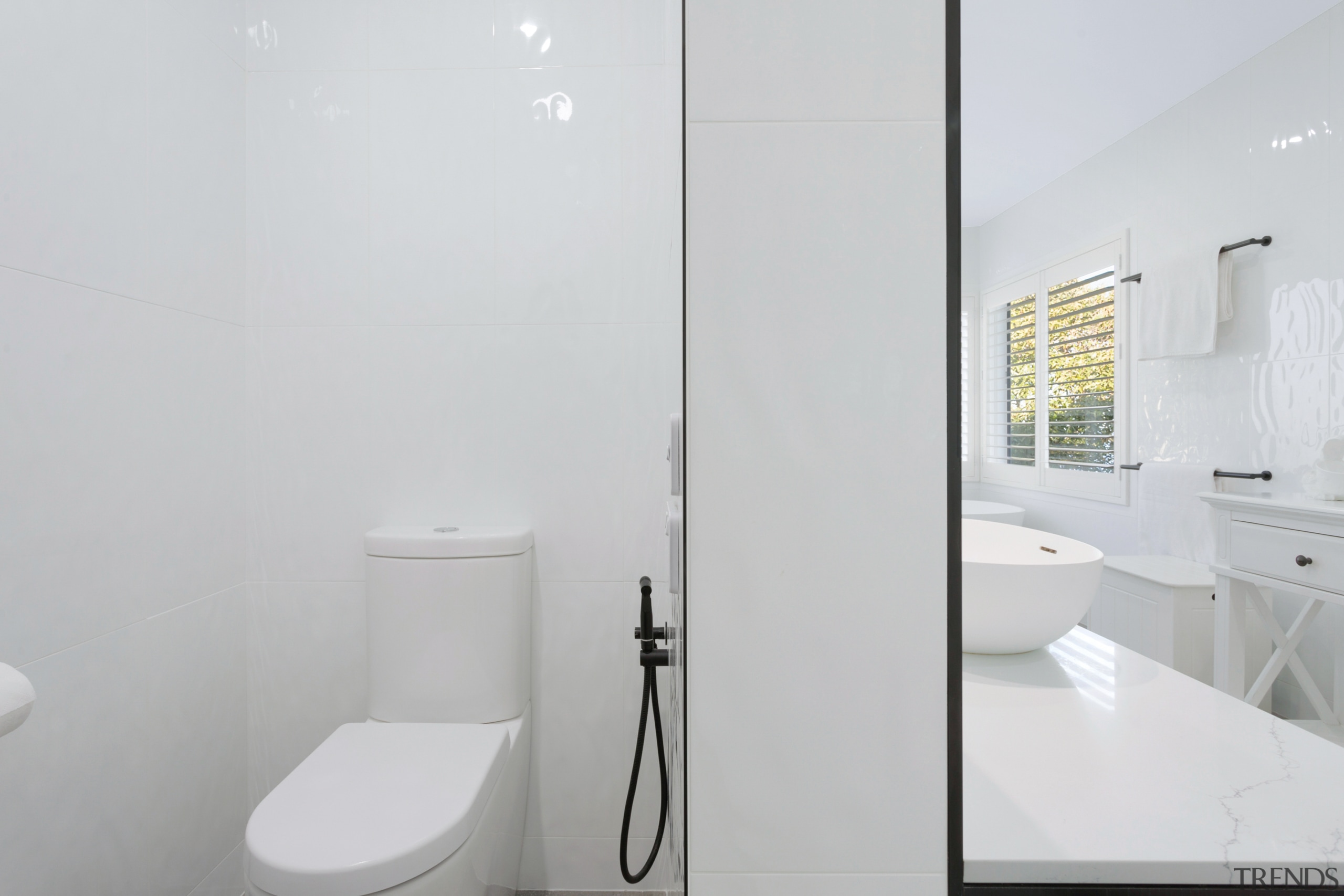 While lacking a door, the toilet's location allows 