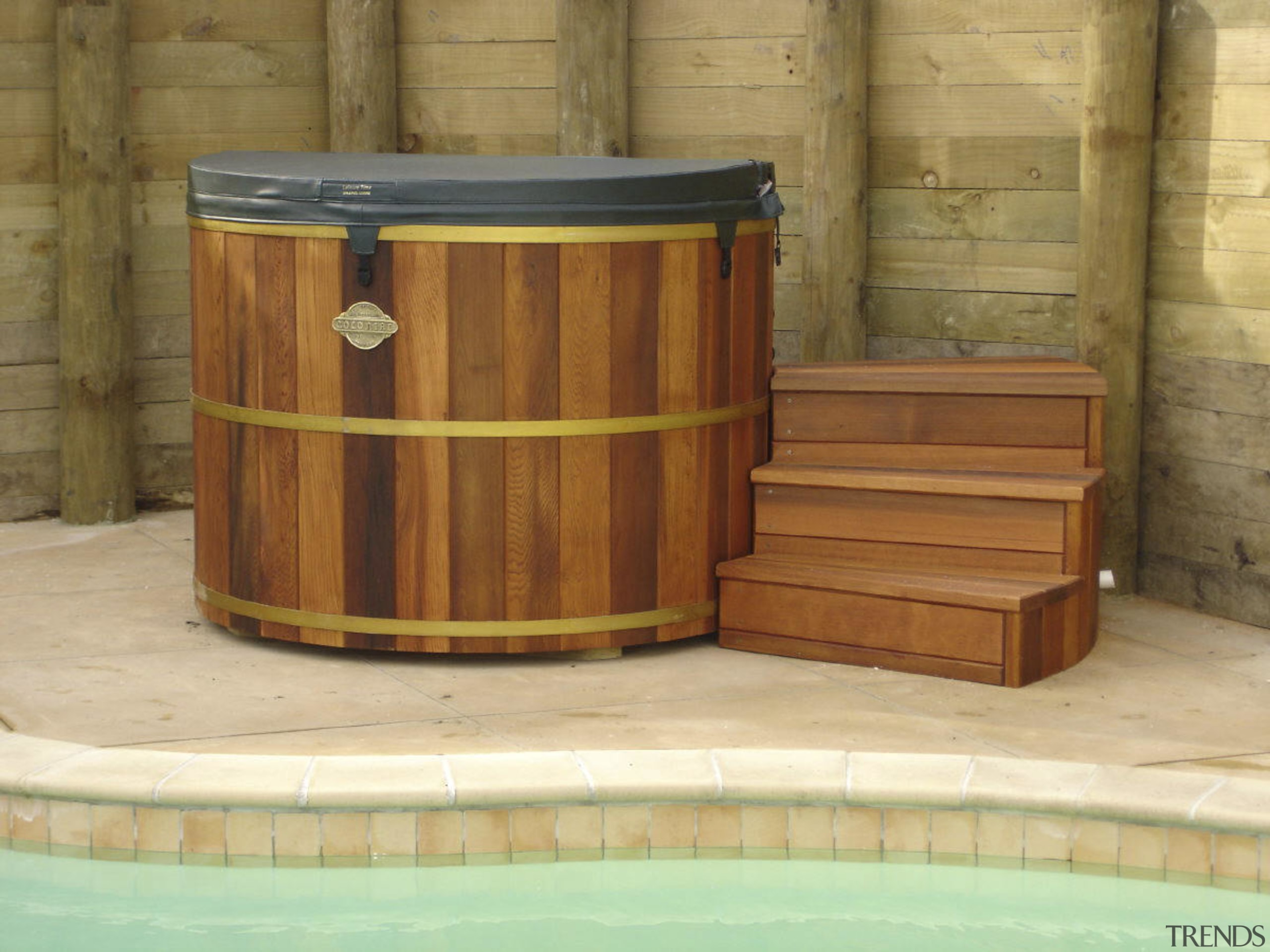 View of the traditional tub which has a barrel, wood, wood stain, brown