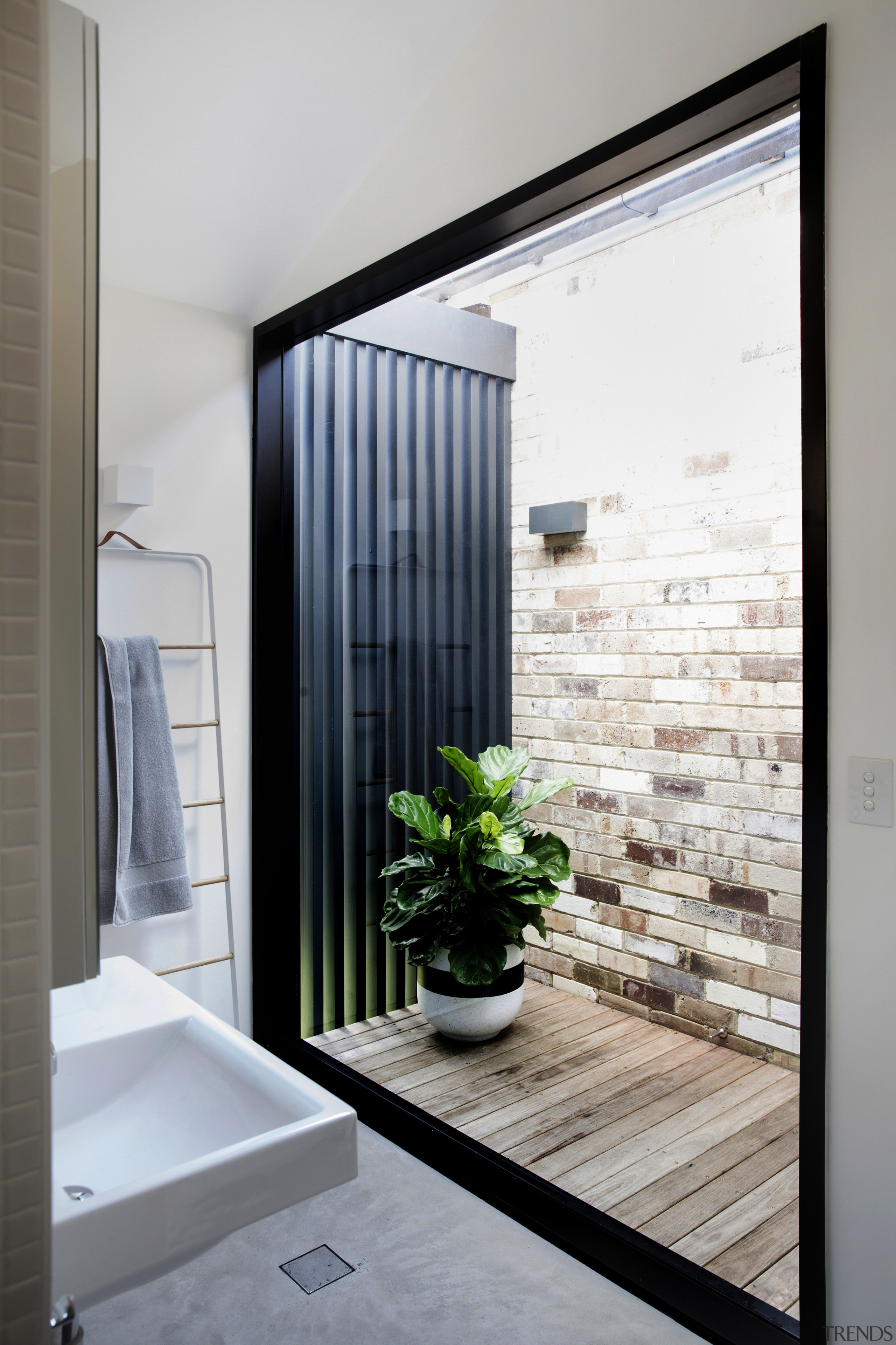 Natural light floods into this ensuite from one architecture, home, house, interior design, room, window, gray, white