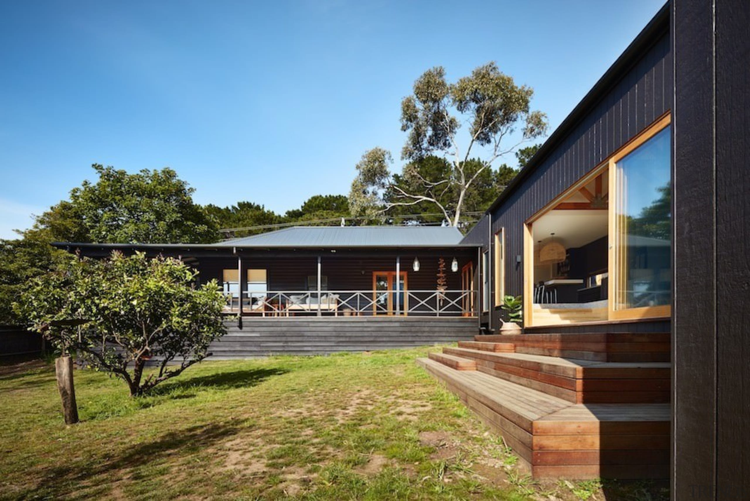 A view of the veranda - A view architecture, cottage, estate, facade, farmhouse, home, house, property, real estate, brown, teal