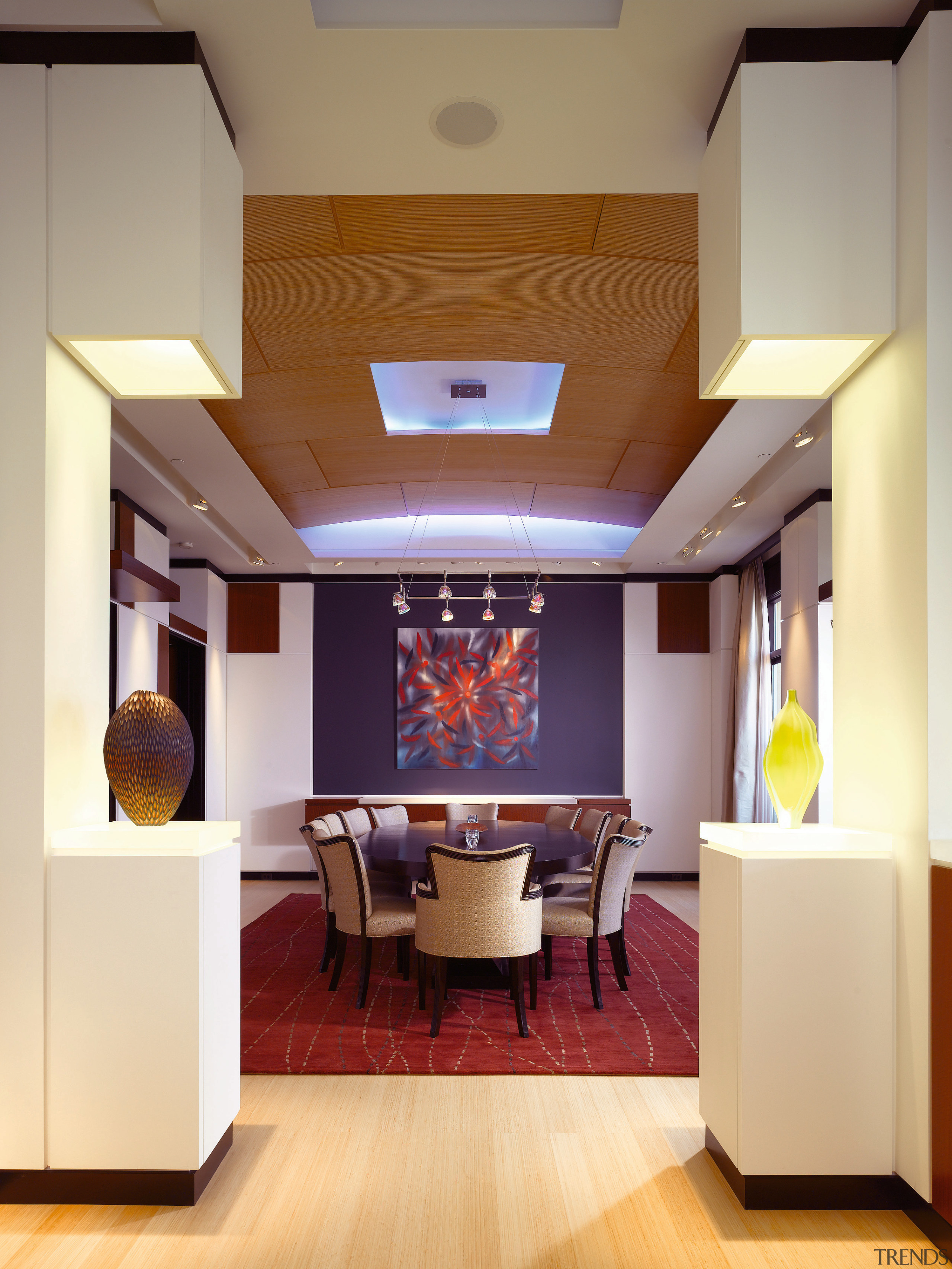 view of dining room featuring dining furniture, rug, ceiling, interior design, living room, room, orange