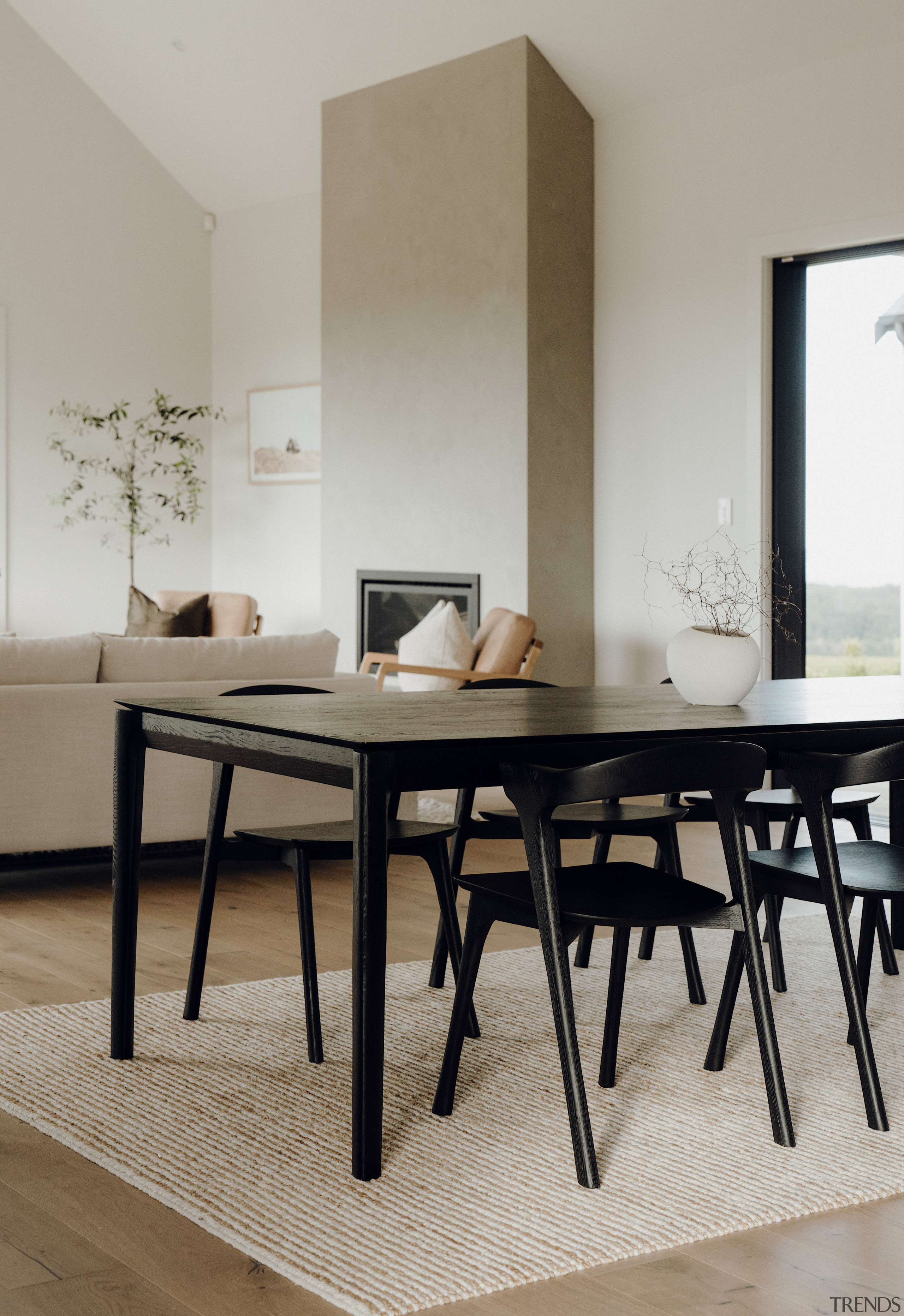 A natural mat helps delineate the dining area 