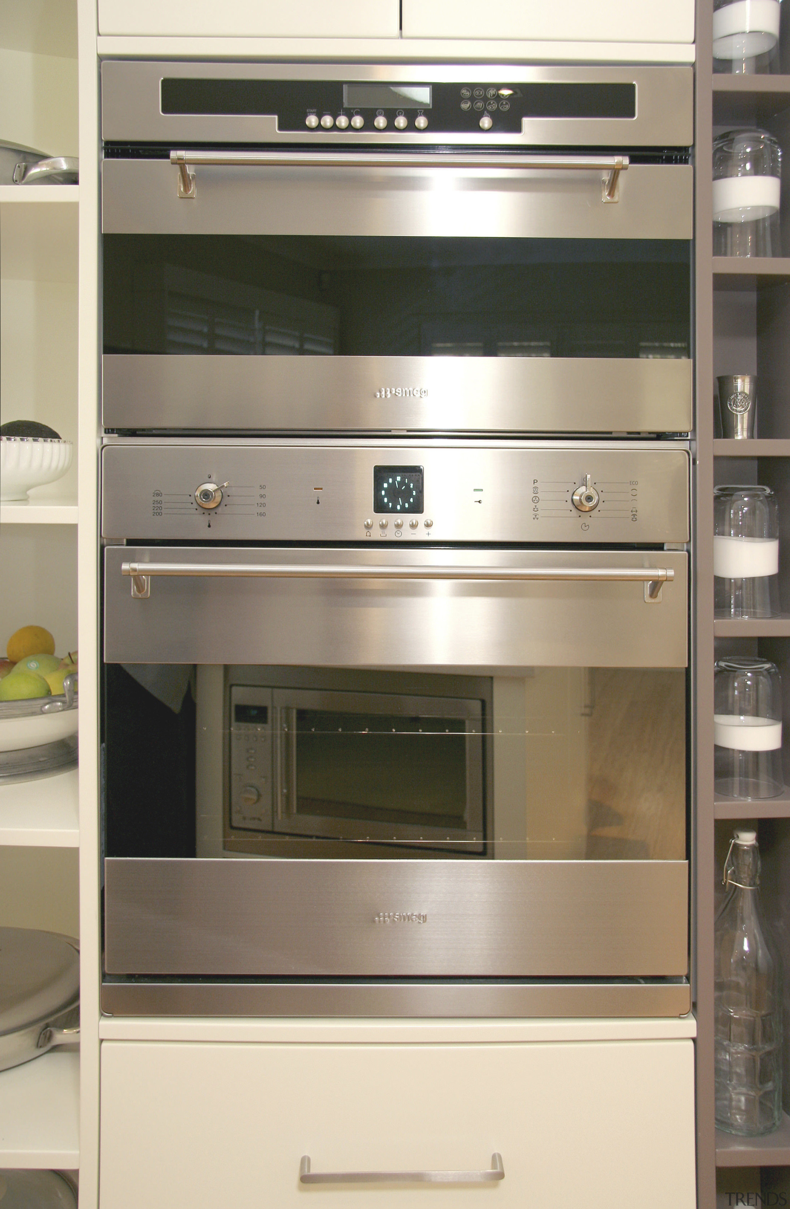 Image of Smeg appliances used in kitchen which countertop, furniture, home appliance, kitchen, kitchen appliance, microwave oven, oven, white, brown