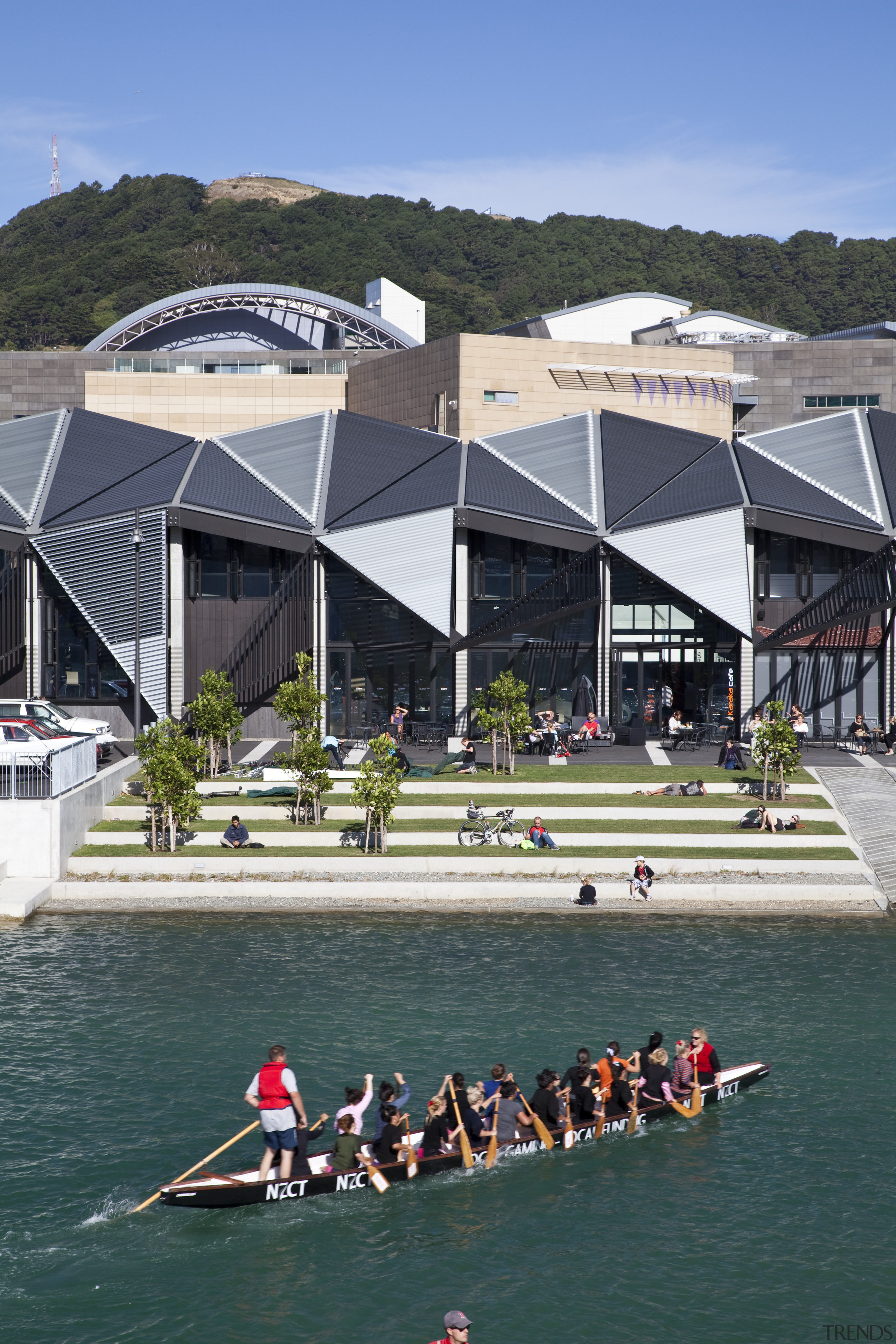 View of the Wharewaka building on the Wellington boat, boating, boats and boating equipment and supplies, leisure, outdoor recreation, recreation, rowing, tourism, water, water sport, water transportation, watercraft rowing, waterway, teal