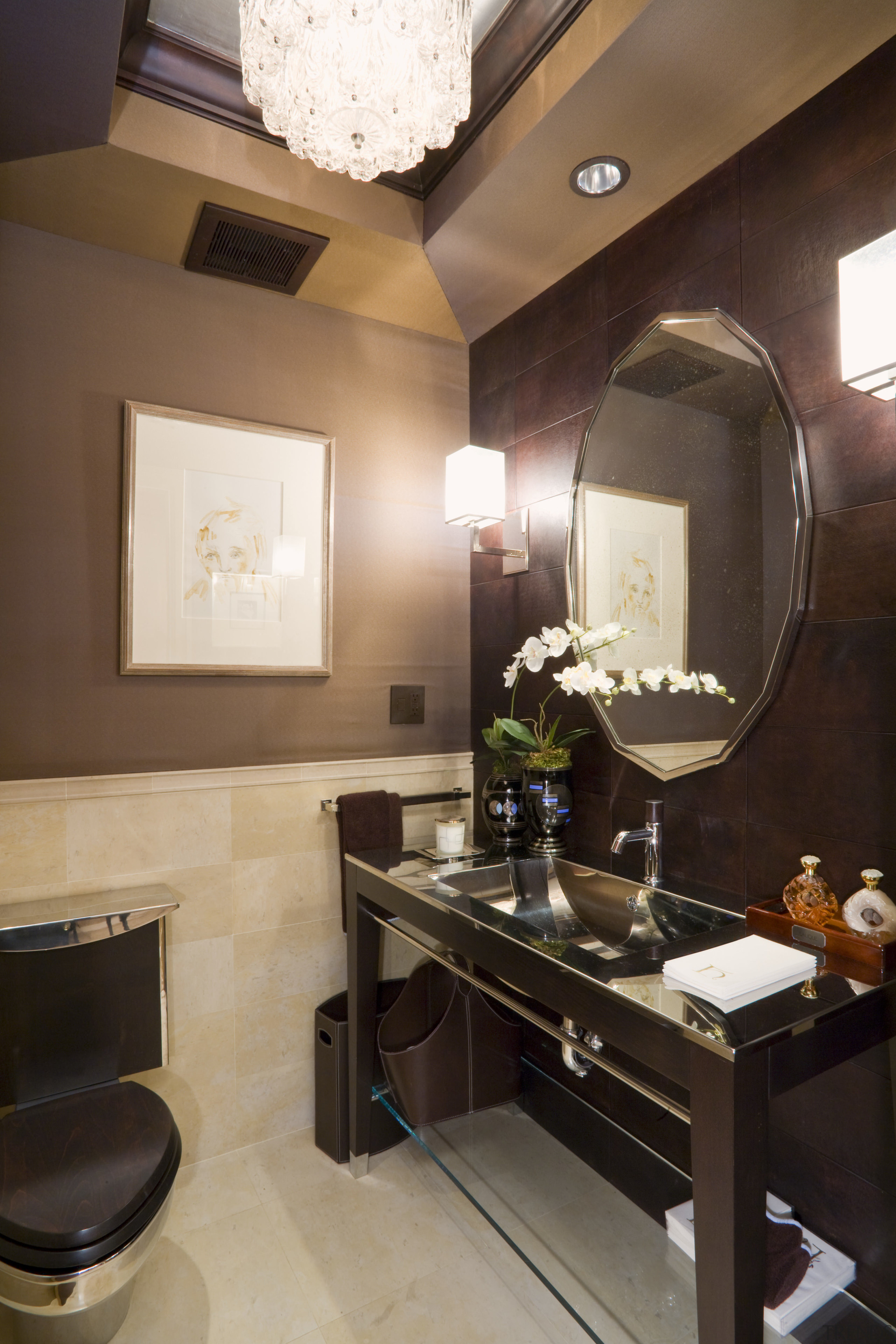 View of bathroom and toilet featuring vanity with bathroom, ceiling, home, interior design, room, suite, black, brown