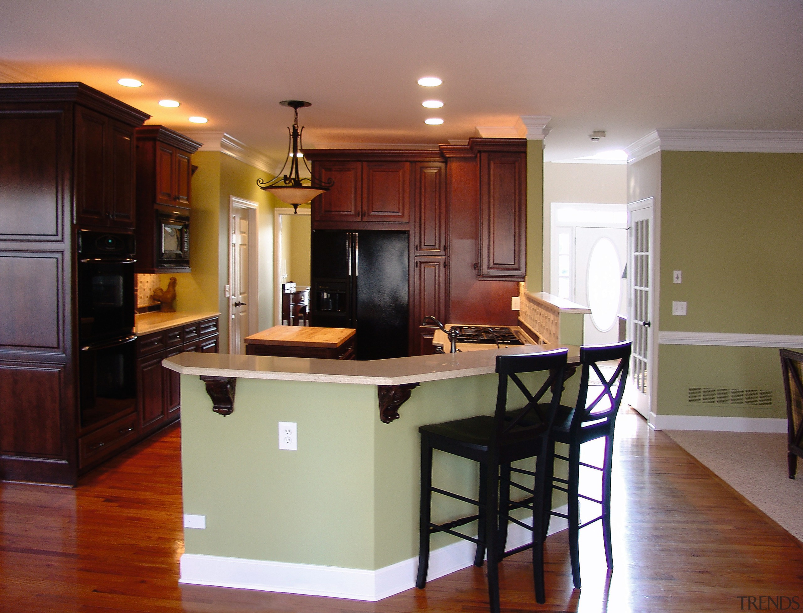 A view of this kitchen designed by Box cabinetry, countertop, cuisine classique, floor, flooring, hardwood, interior design, kitchen, room, wood flooring