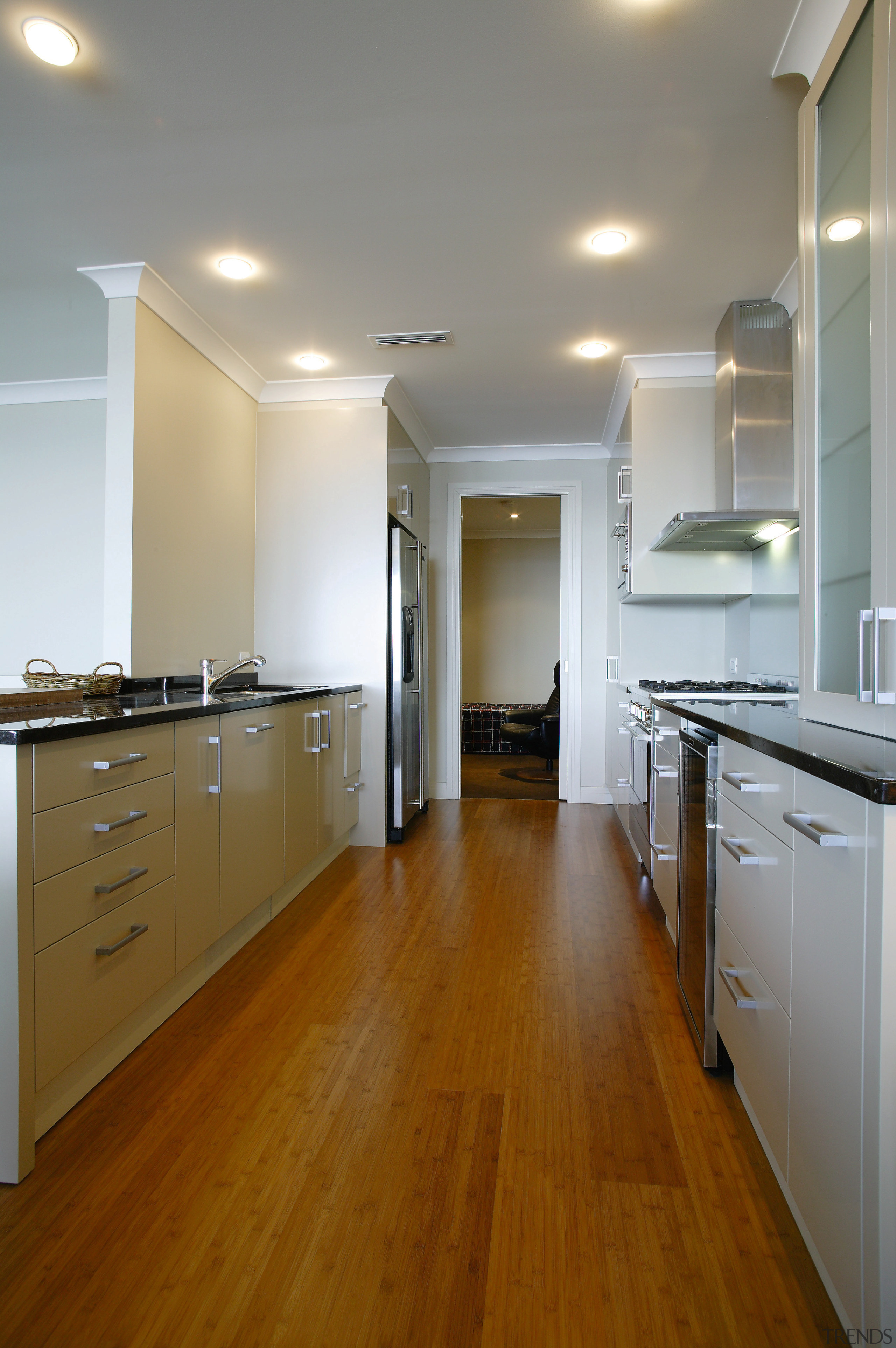 A view of the kitchen featuring solid bamboo cabinetry, ceiling, countertop, floor, flooring, hardwood, home, interior design, kitchen, laminate flooring, real estate, room, wood, wood flooring, gray, brown