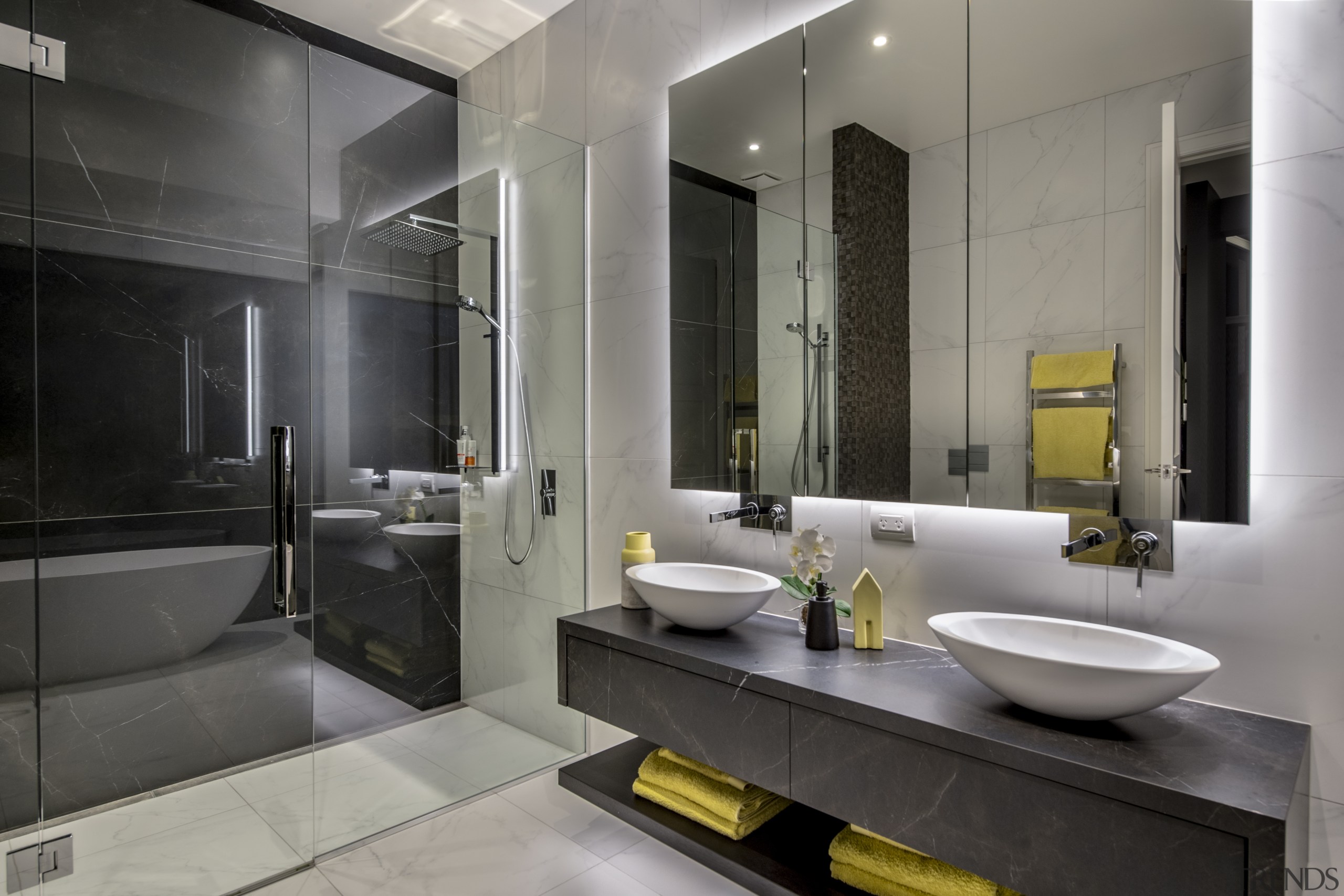 ​​​​​​​This refined master bathroom, directly behind the master 