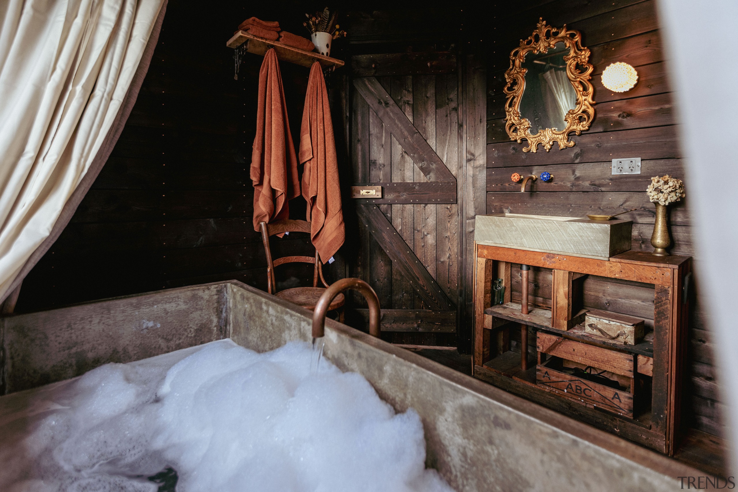 Bathroom, completely rebuilt, with custom concrete tub. 