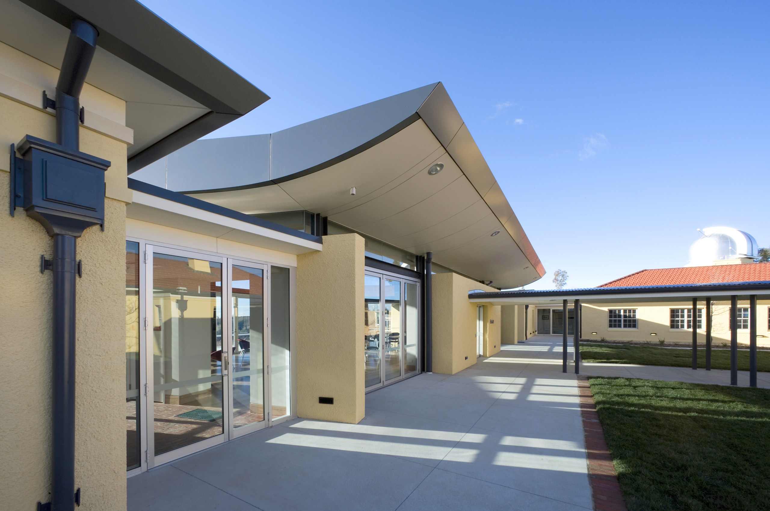 Exterior view of the observatory which features steel architecture, house, property, real estate, roof, teal