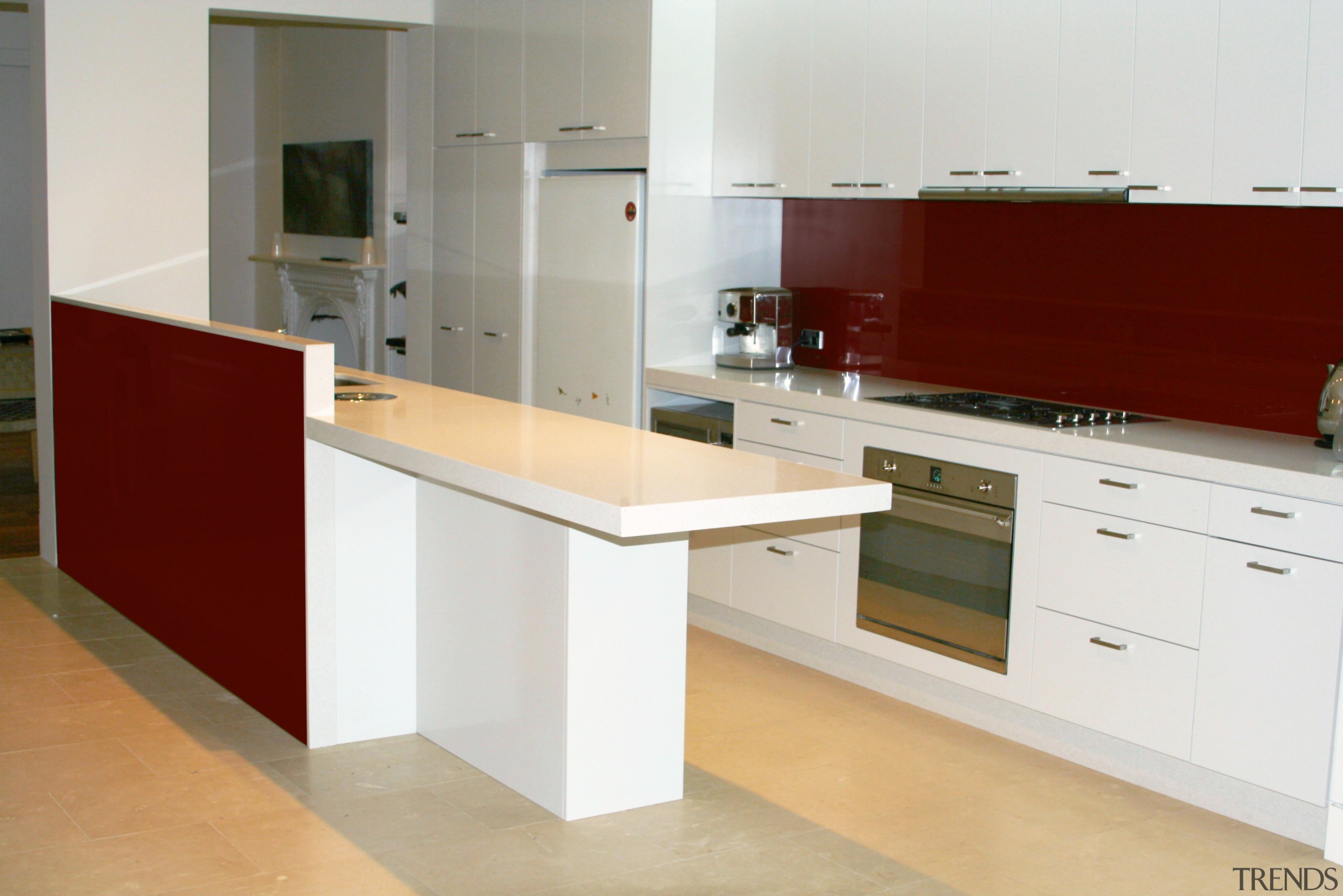 View of kitchen with light coloured stone benchtops, cabinetry, countertop, cuisine classique, floor, furniture, kitchen, product design, room, white