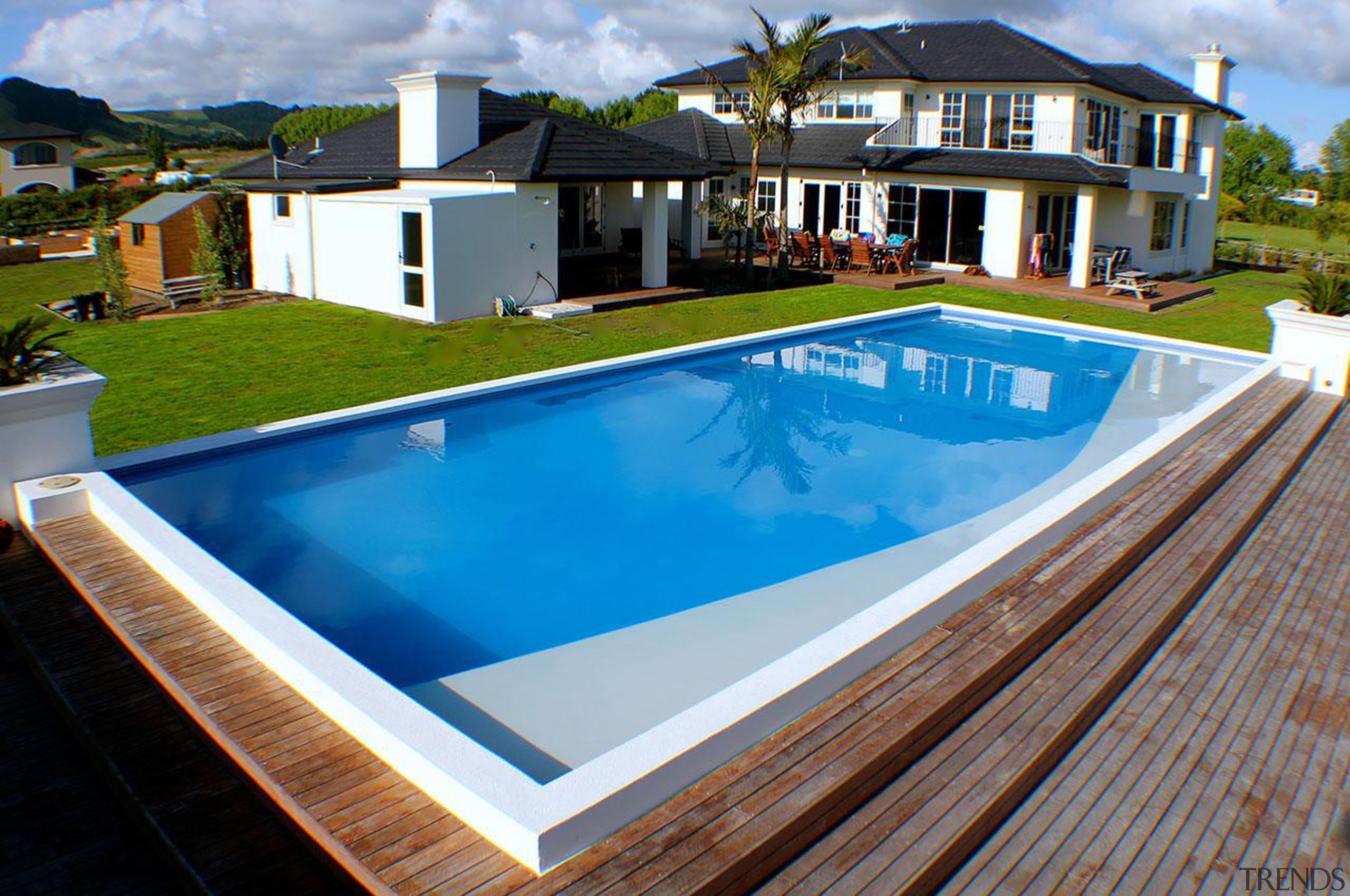 Gold Award recipient for Residential Swimming Pools over estate, home, house, leisure, property, real estate, resort, swimming pool, villa, teal