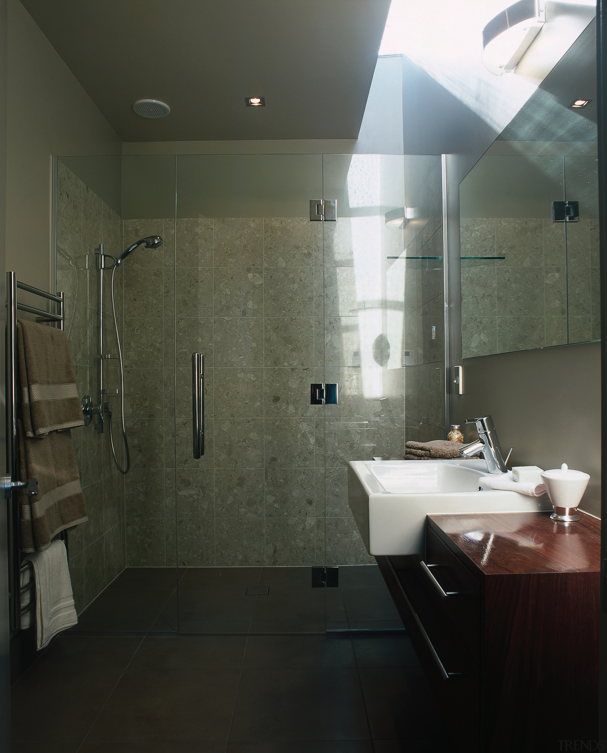 The view of a bathroom featuring a basin architecture, bathroom, ceiling, floor, interior design, plumbing fixture, property, room, tile, black, gray