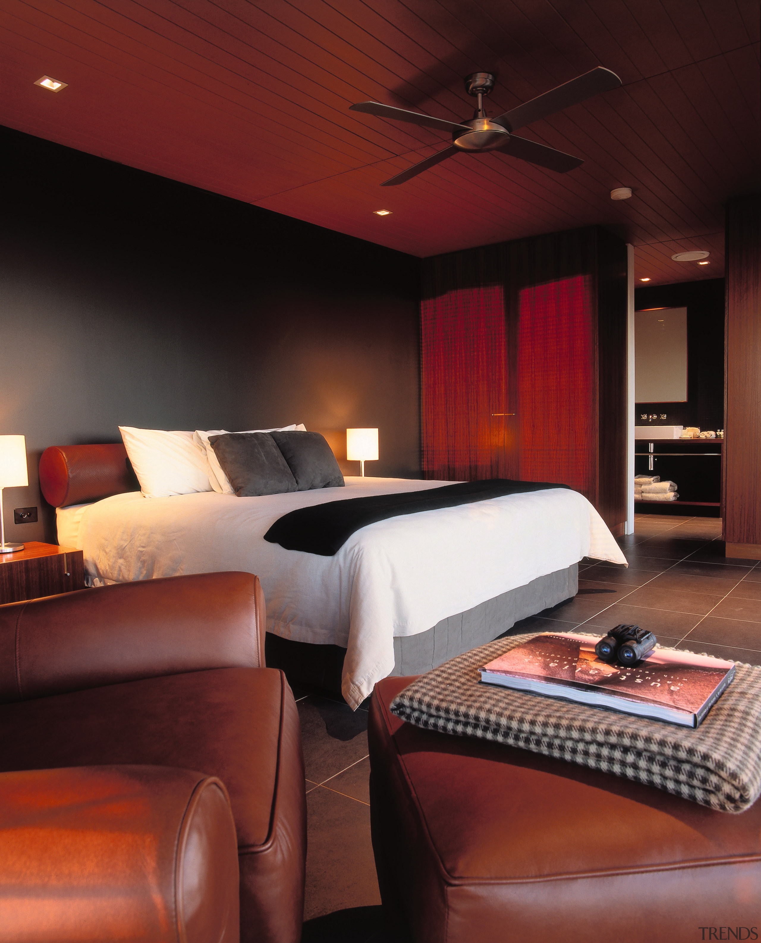 view of the guest bedrooms  that are bed frame, bedroom, ceiling, interior design, lighting, room, suite, wall, black, red