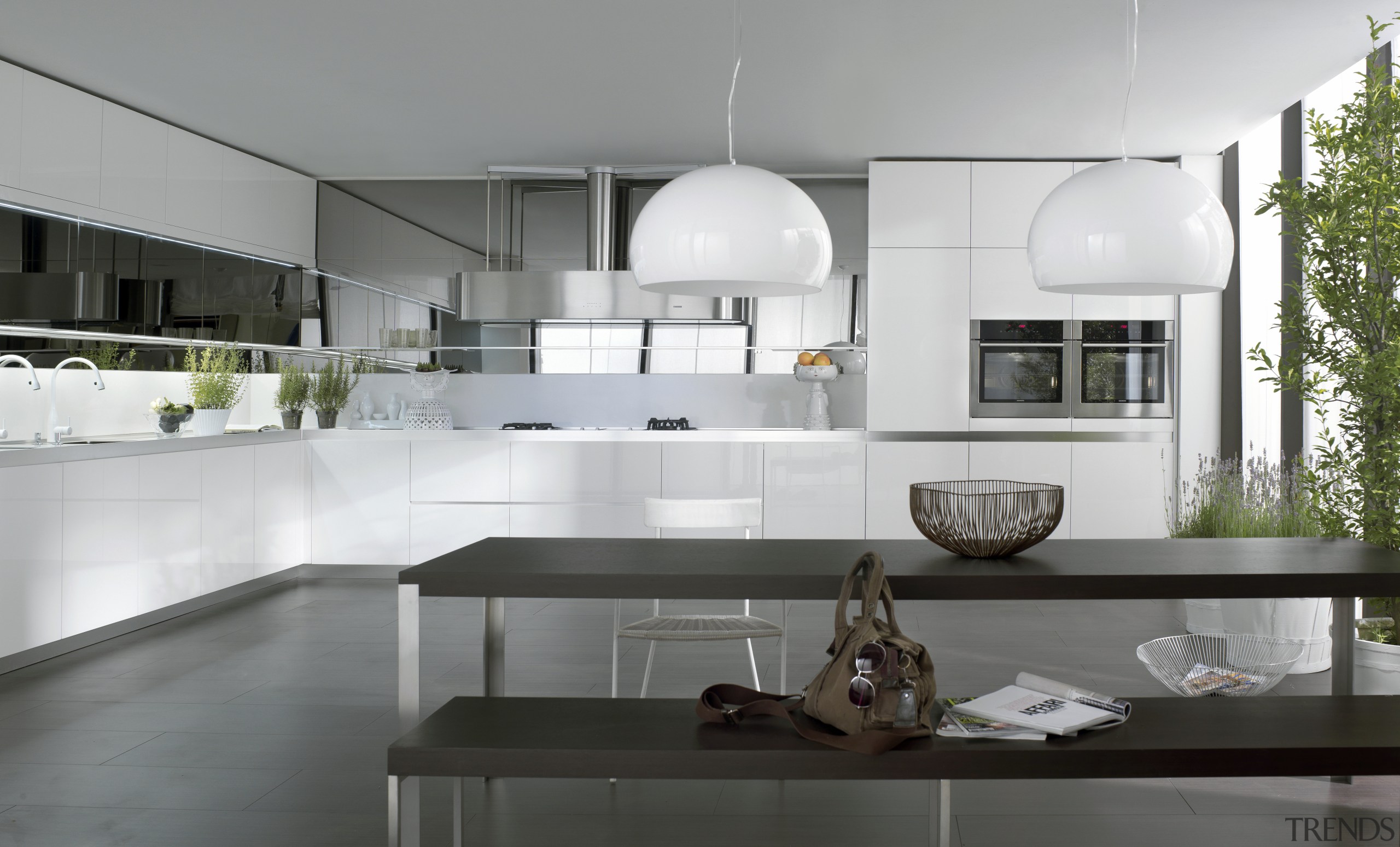 View of contemporary white kitchen and dining area. architecture, countertop, cuisine classique, interior design, kitchen, product design, gray, white