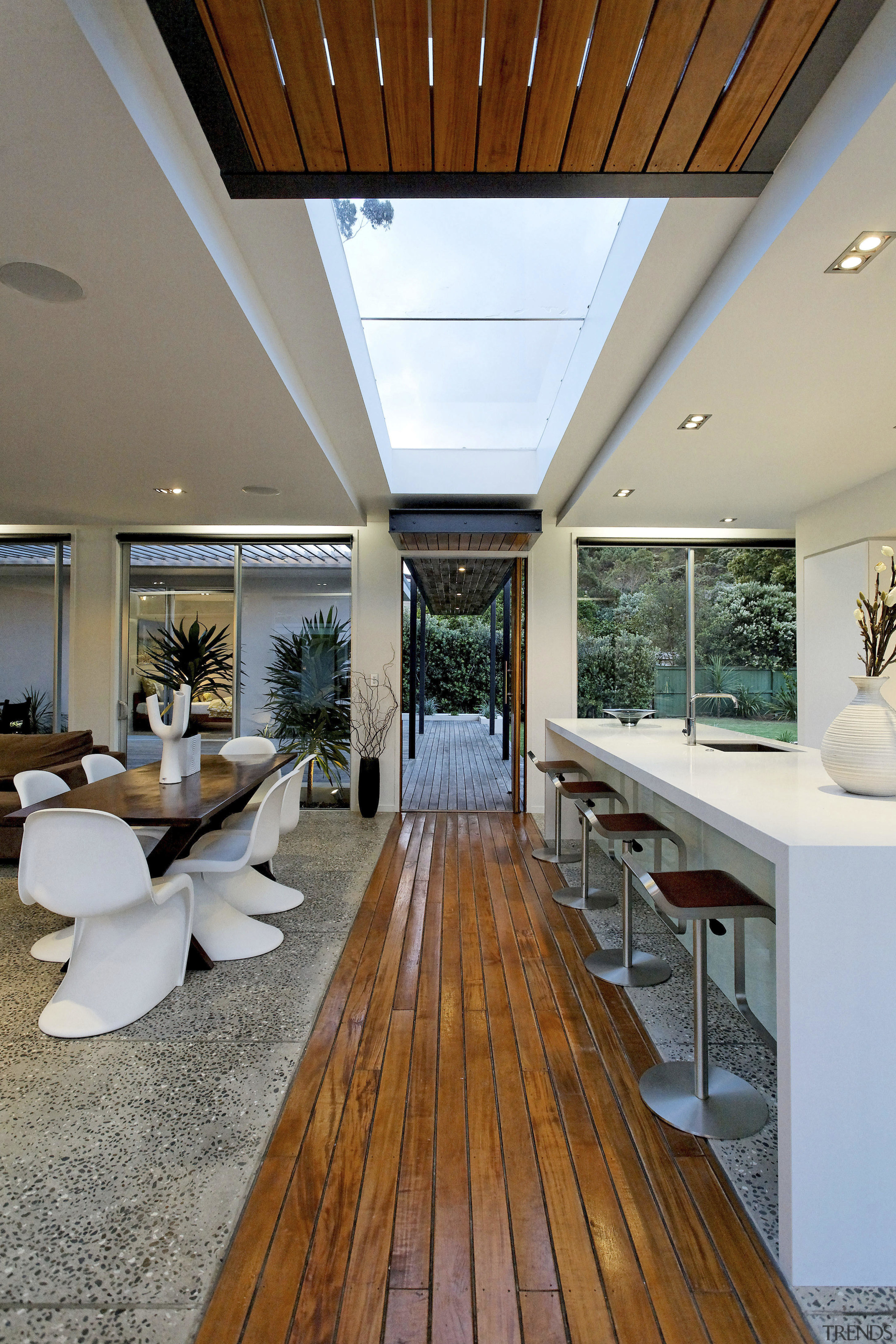 Interior view of kitchen &amp; dining area, features ceiling, daylighting, floor, flooring, house, interior design, real estate, wood, gray, brown