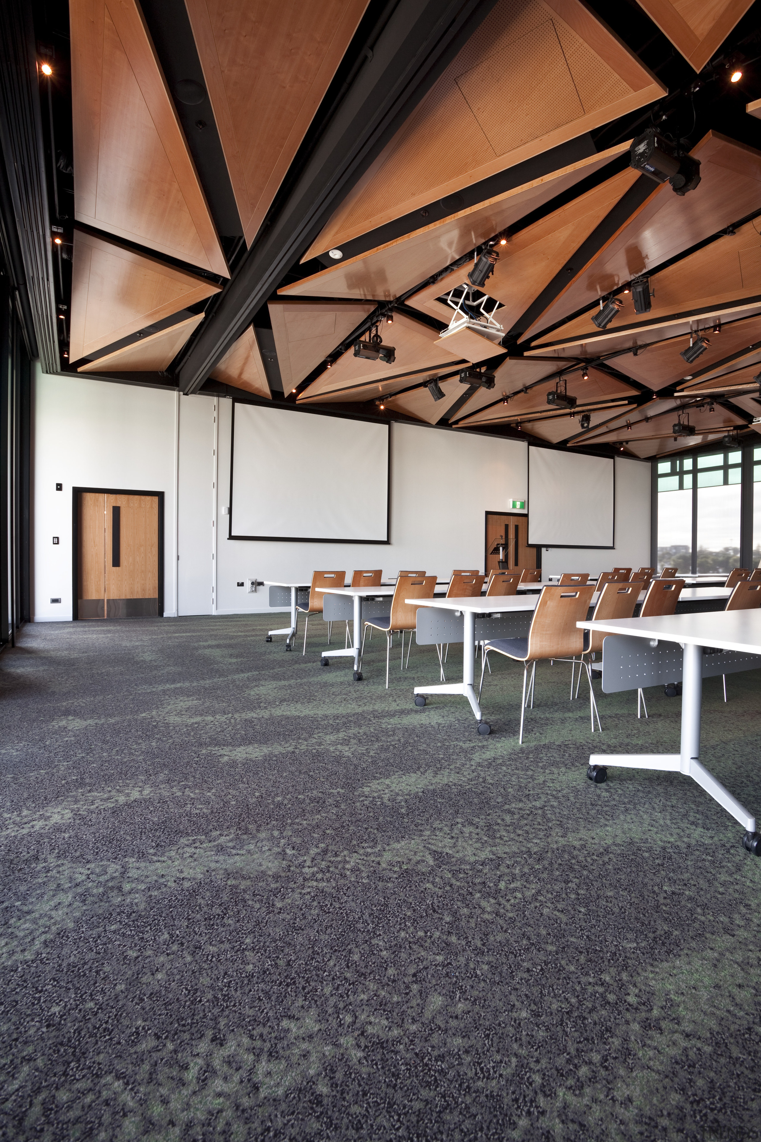 Interior of the Novotel Auckland Airport. Carpets supplied architecture, ceiling, daylighting, floor, flooring, interior design, real estate, roof, table, black, gray