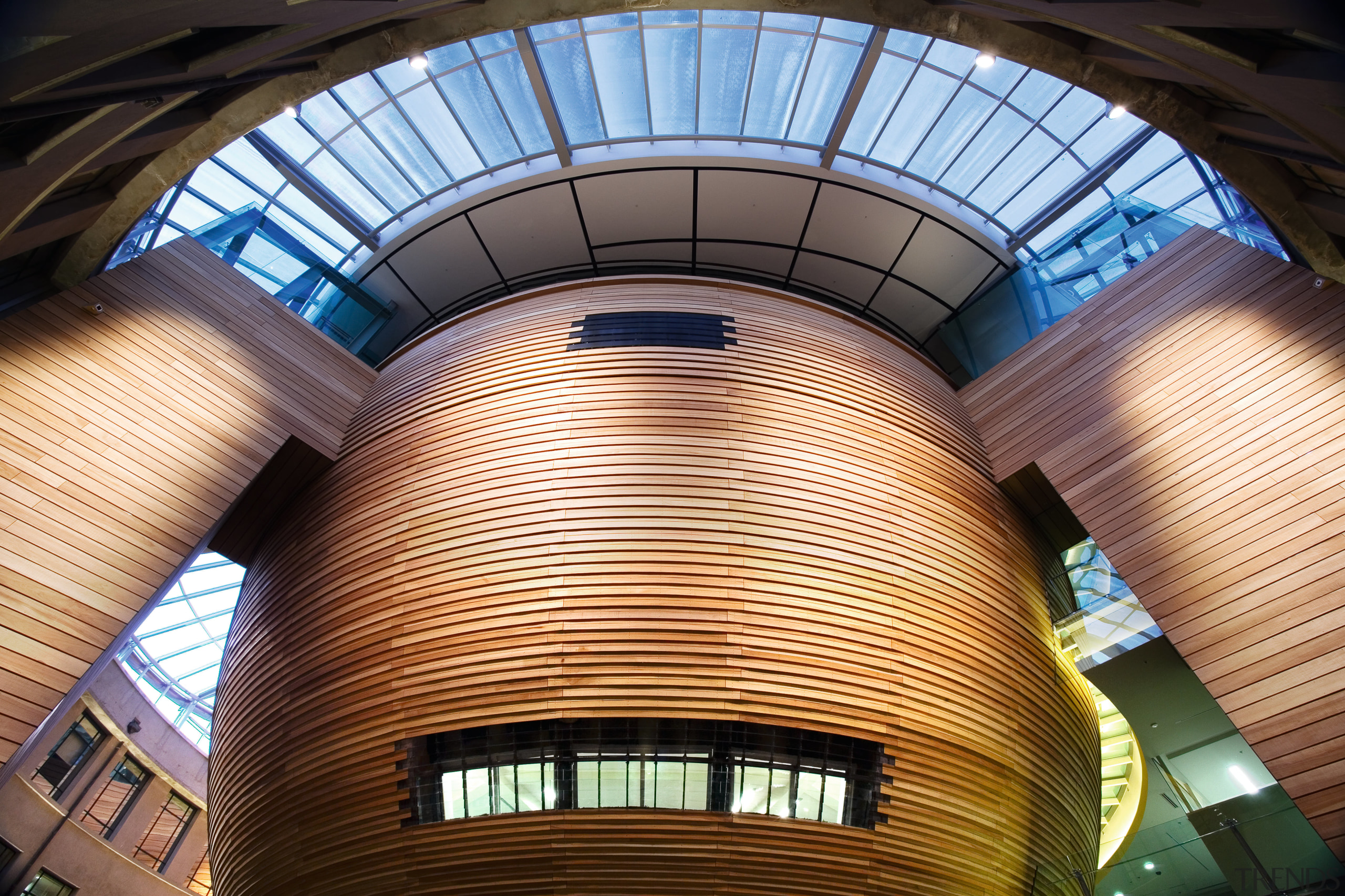 View of the suspended wooden bowl in the architecture, building, ceiling, daylighting, daytime, facade, landmark, lighting, metropolitan area, structure, symmetry, tourist attraction