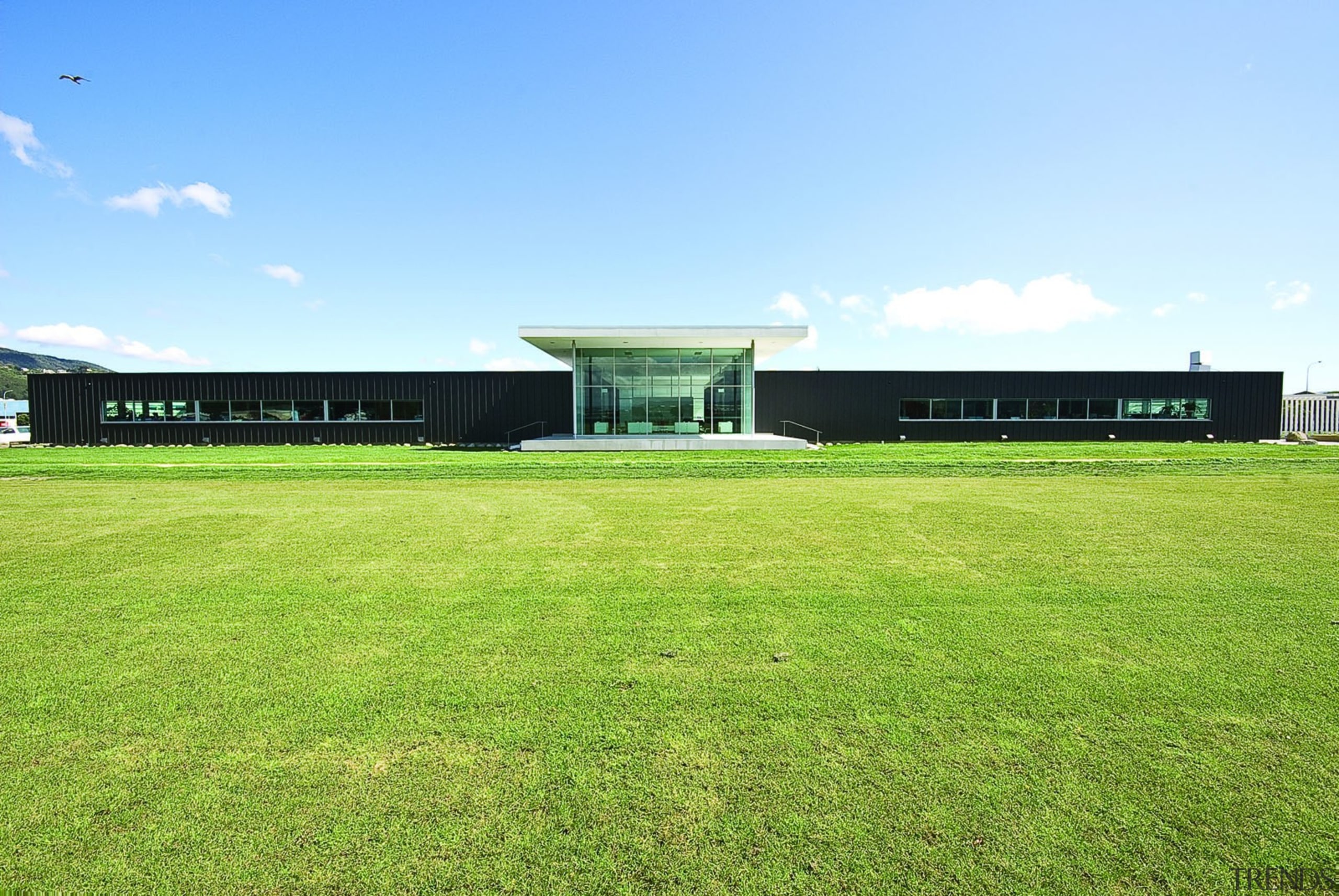 KEV0444 - KEV0 444 - architecture | campus architecture, campus, corporate headquarters, daytime, energy, estate, farm, field, grass, grassland, house, land lot, lawn, pasture, plain, plant, property, real estate, sky, sport venue, structure, green, teal