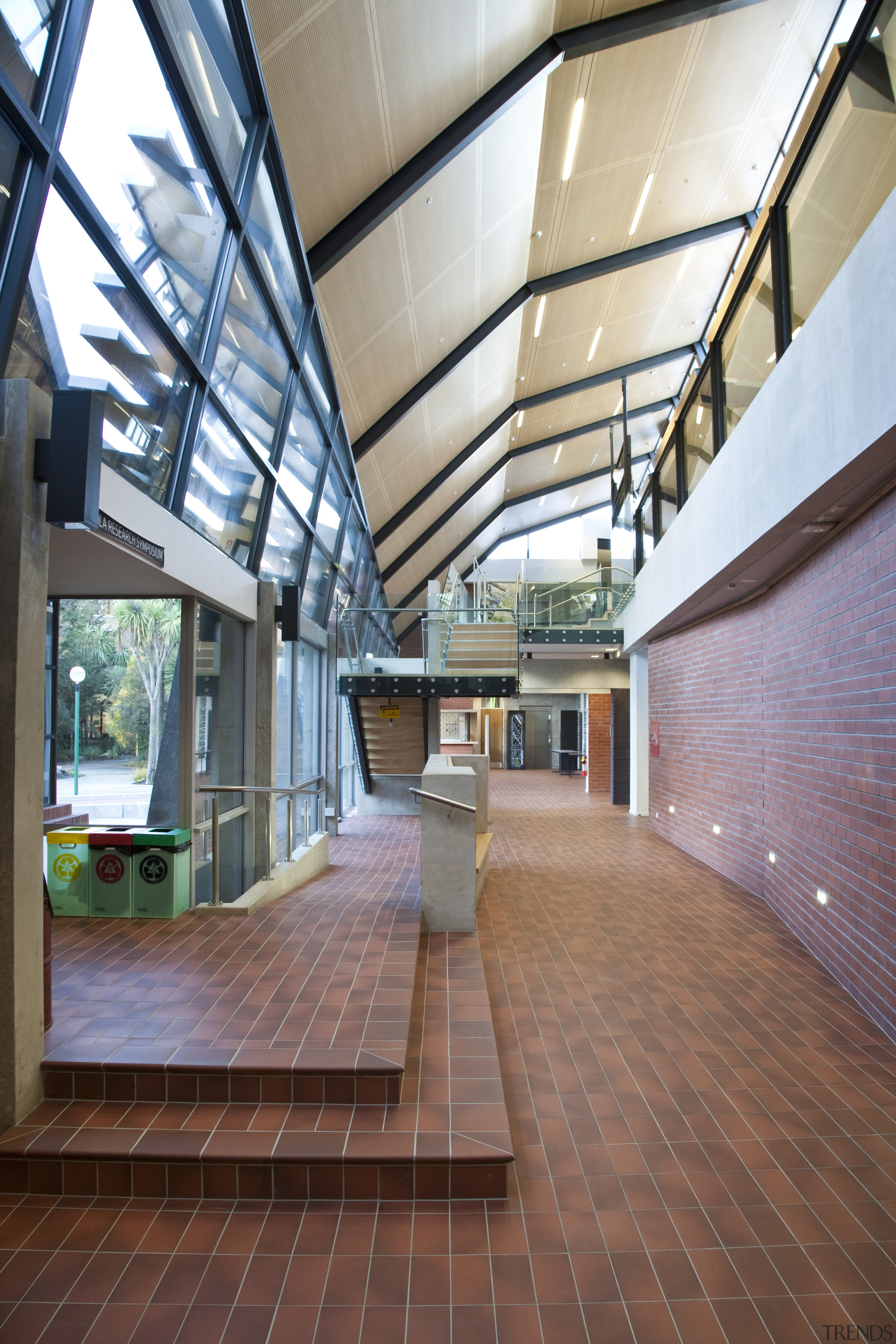 View of the hallway featuring folded canopy - architecture, ceiling, daylighting, estate, floor, interior design, lobby, real estate, roof, wood, red, gray