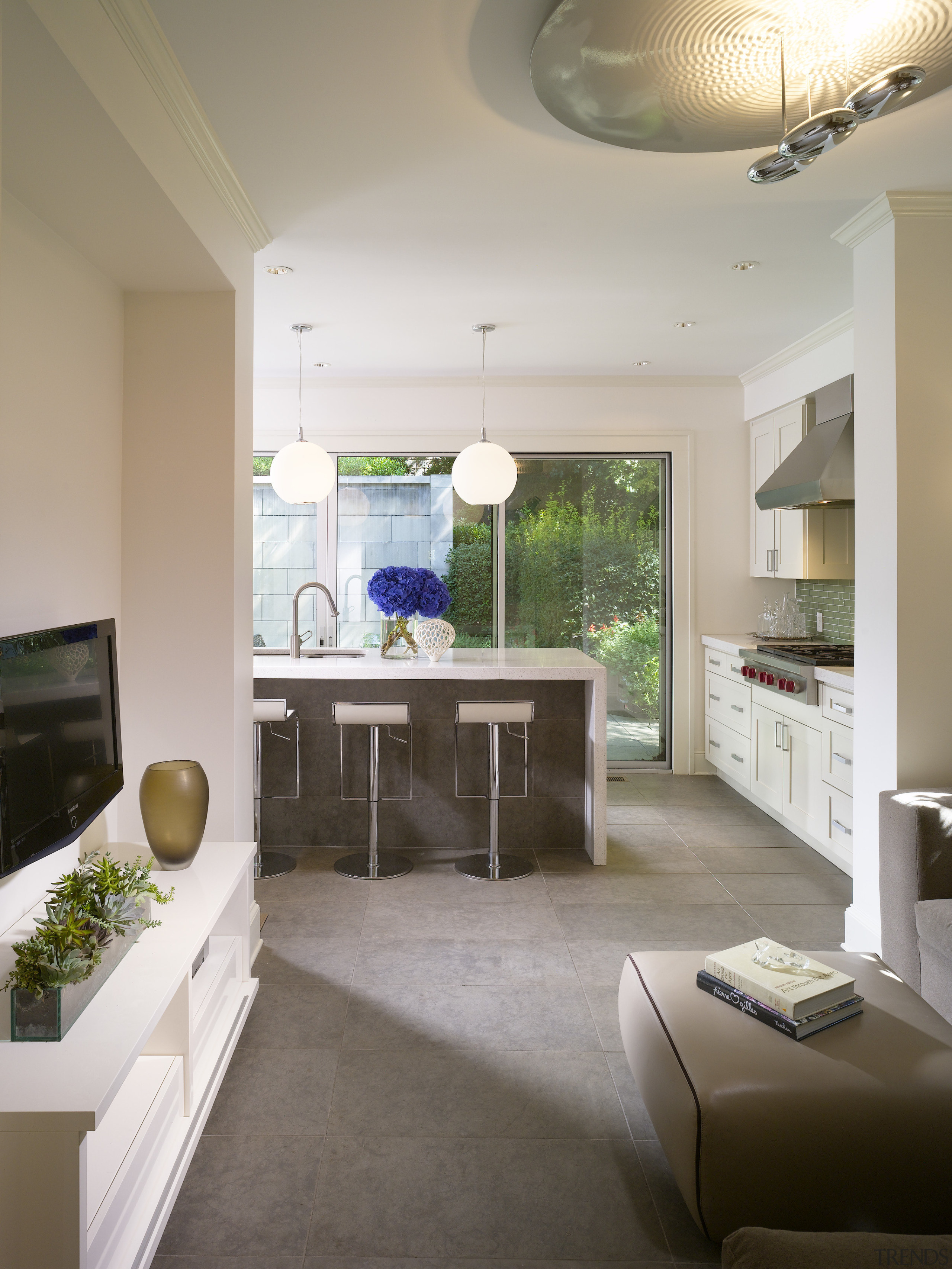 View of kitchen featuring island with CaesarStone countertops, architecture, ceiling, countertop, floor, home, house, interior design, kitchen, living room, real estate, room, table, gray