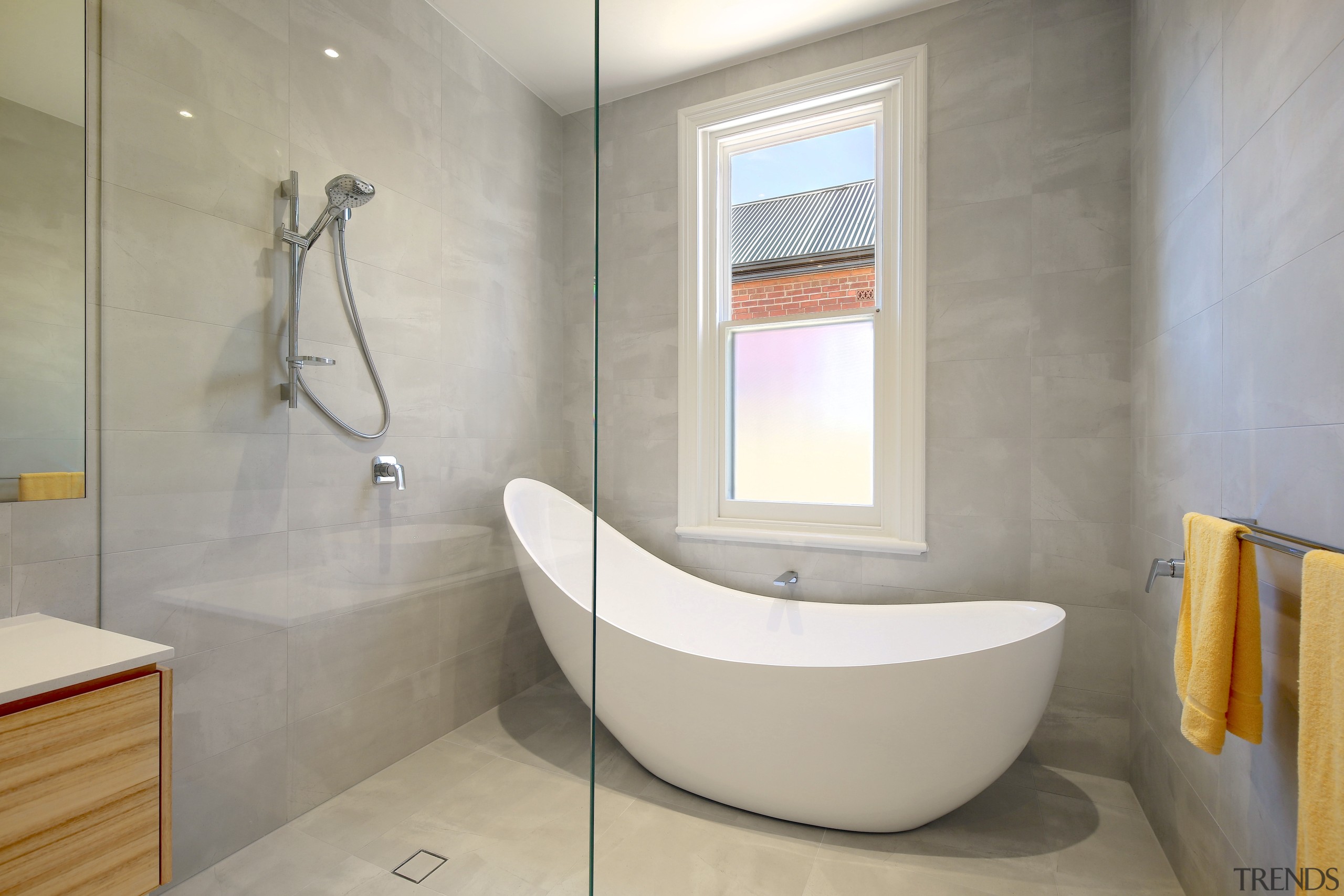 A wow factor bath was just one of architecture, bathroom, bathtub, building, ceiling, floor, flooring, house, interior design, material property, plumbing fixture, property, real estate, room, tap, tile, wall, gray