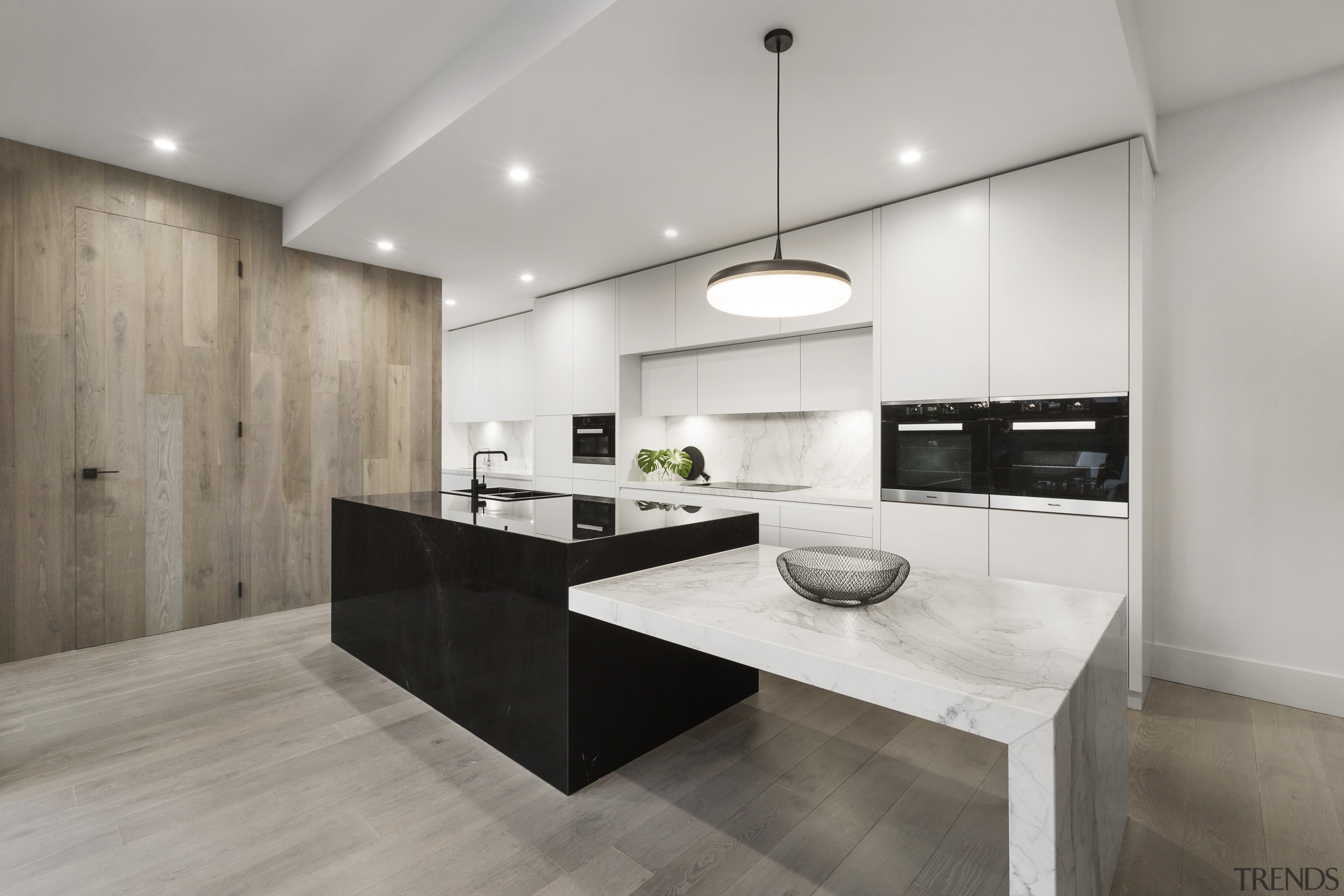 ​​​​​​​Black granite, white marble and wood – the architecture, countertop, floor, flooring, timber, interior design, kitchen, wood flooring, marble, LSA Architects