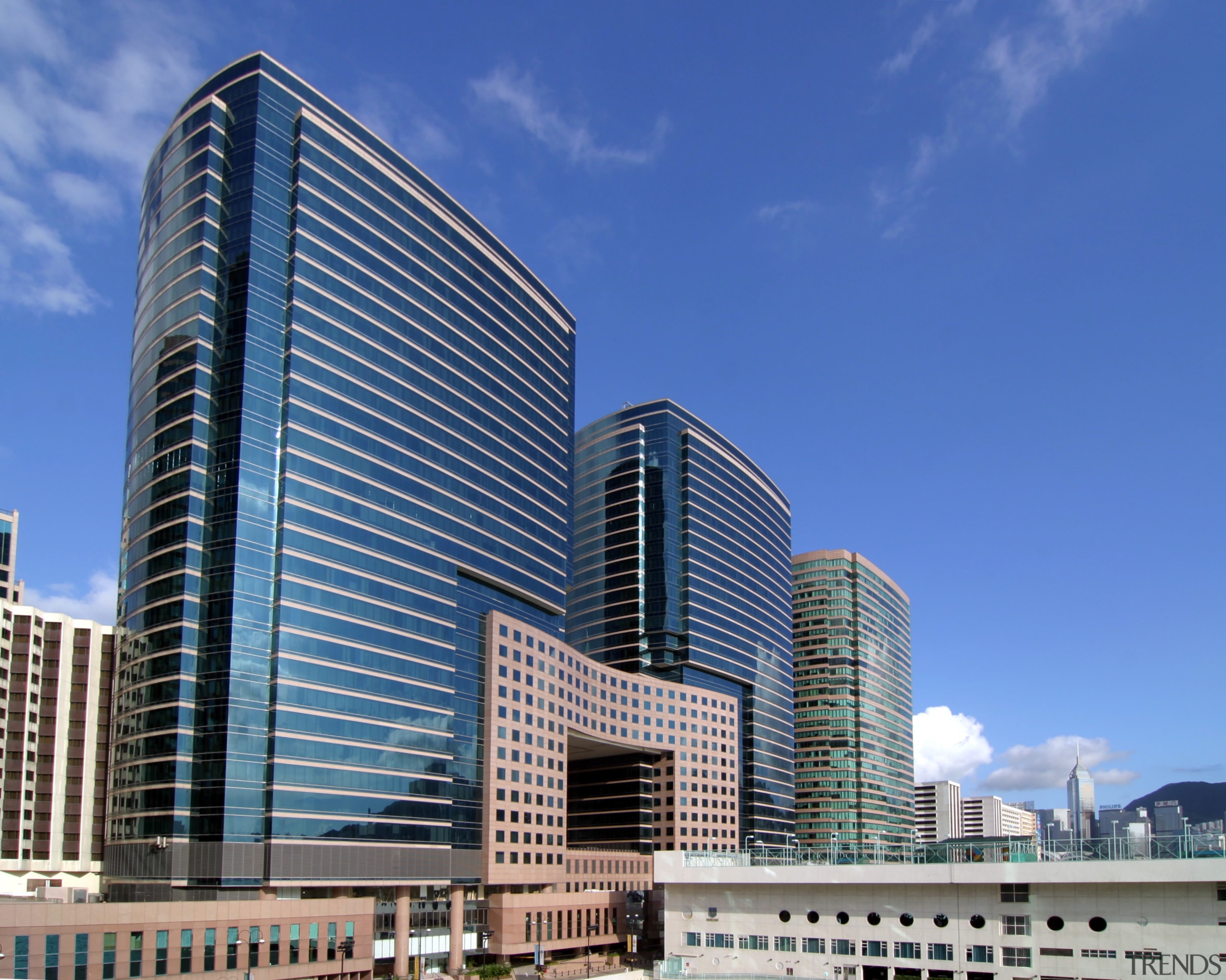 The Hong Kong skyline will continue to change architecture, building, city, cityscape, commercial building, condominium, corporate headquarters, daytime, downtown, facade, headquarters, metropolis, metropolitan area, mixed use, real estate, sky, skyline, skyscraper, tower block, urban area, blue