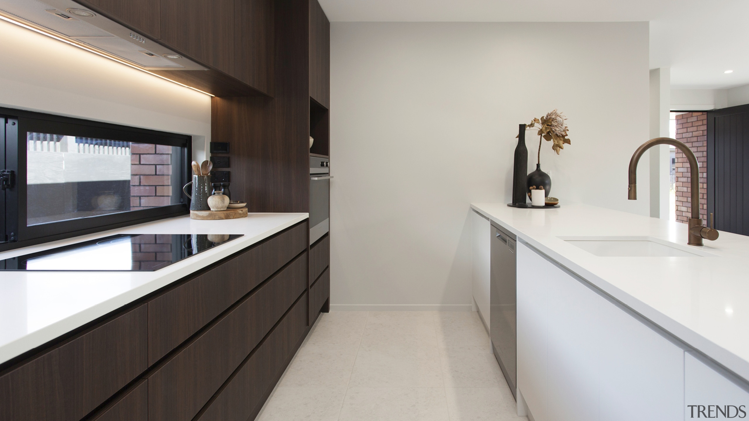 Recessed pulls contribute to the kitchen's pared back 