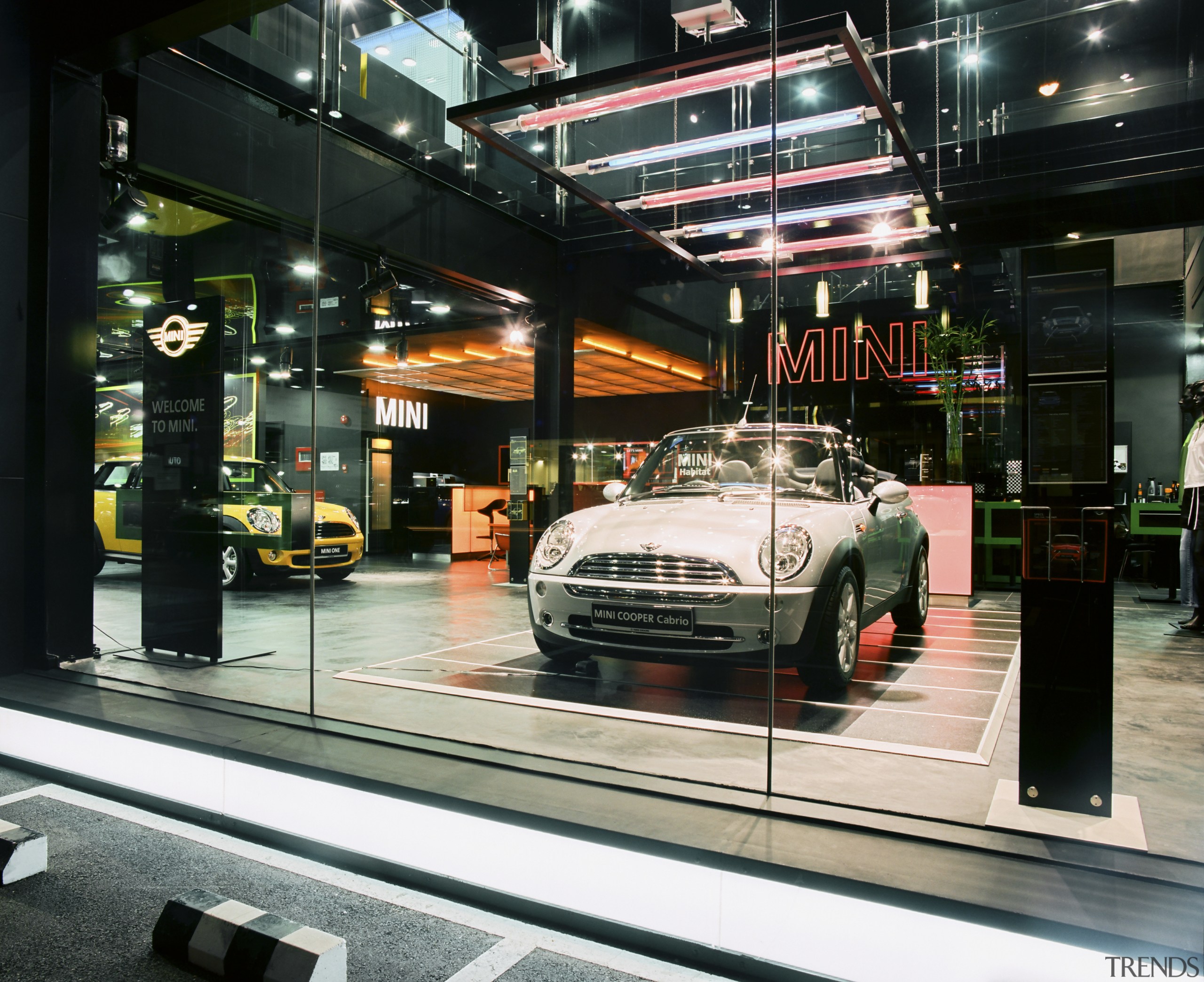 The LED-lit exterior frames are synchronised with the auto show, automotive design, building, car, motor vehicle, vehicle, black