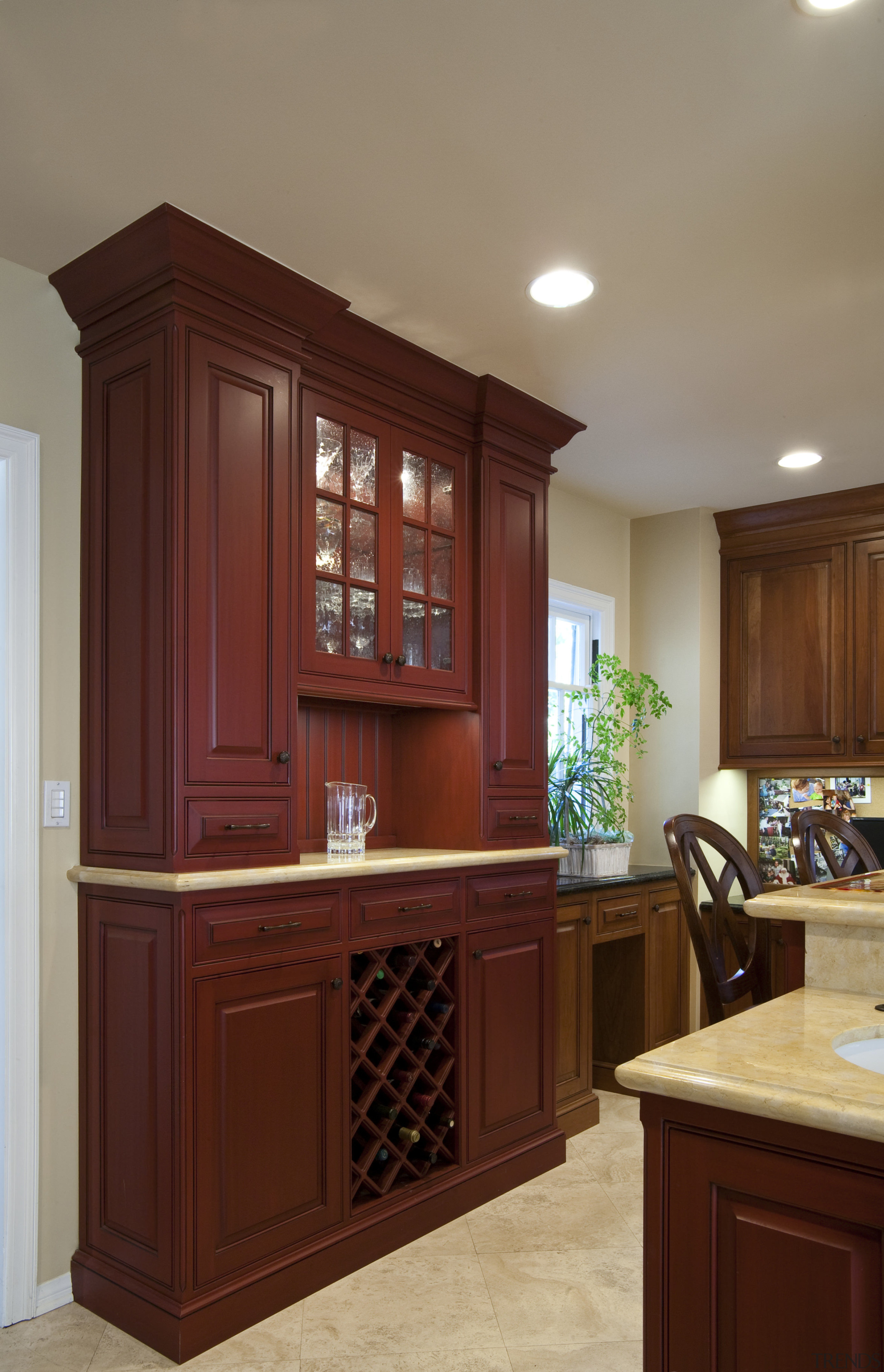 View of a traditional-styled kitchen designed by Pacific cabinetry, countertop, cuisine classique, furniture, hardwood, interior design, kitchen, room, wood stain, red