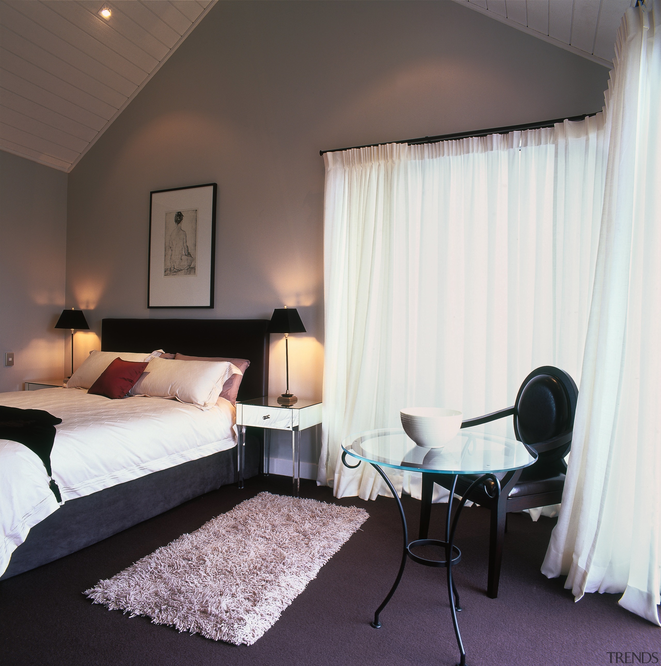 A view of the master bedroom featuring carpetflooring, bed, bed frame, bedroom, ceiling, curtain, floor, furniture, home, interior design, real estate, room, suite, textile, wall, window, window covering, window treatment, white