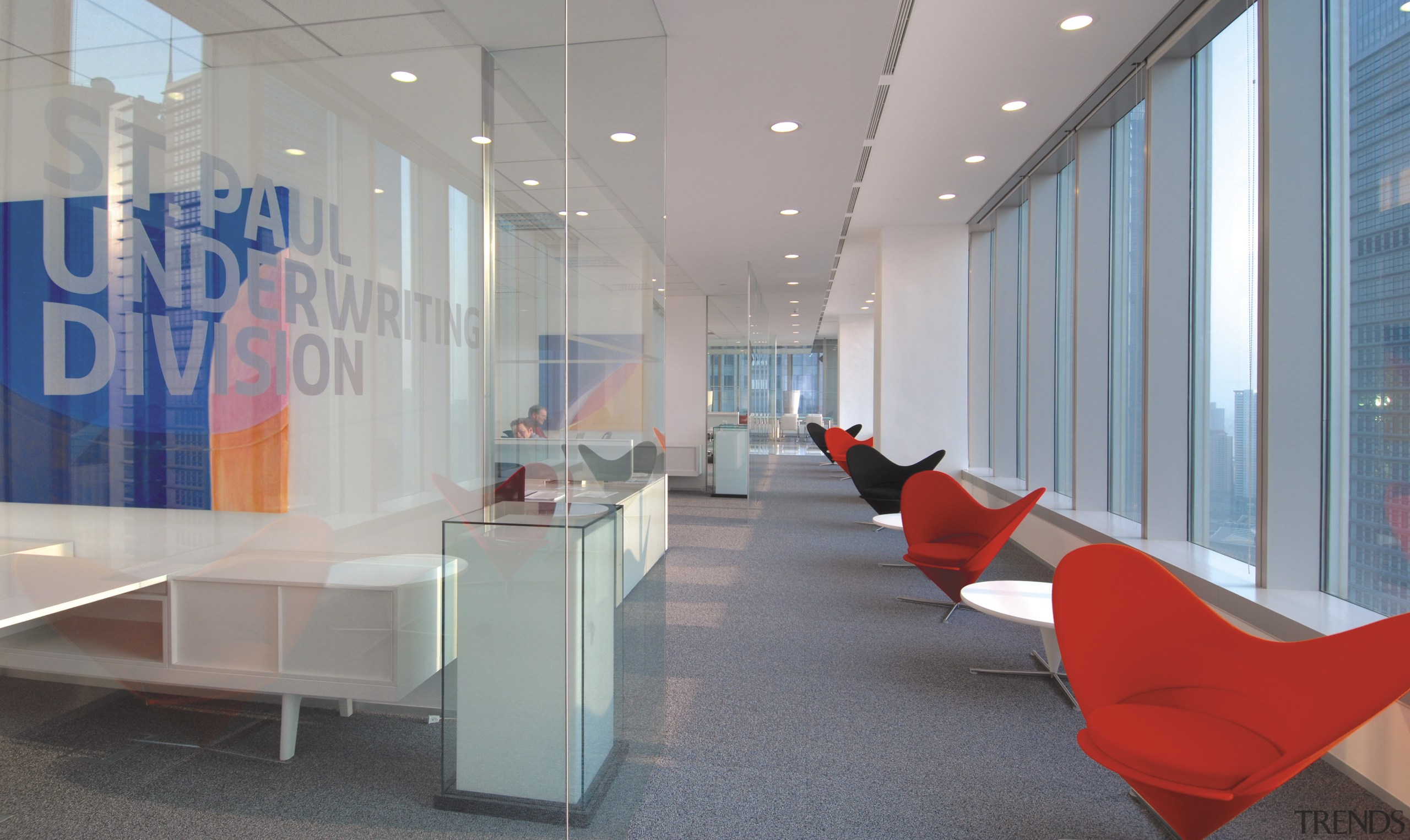 Interior view of Lloyd's Reinsurance Co. featuring stone glass, interior design, lobby, office, real estate, gray