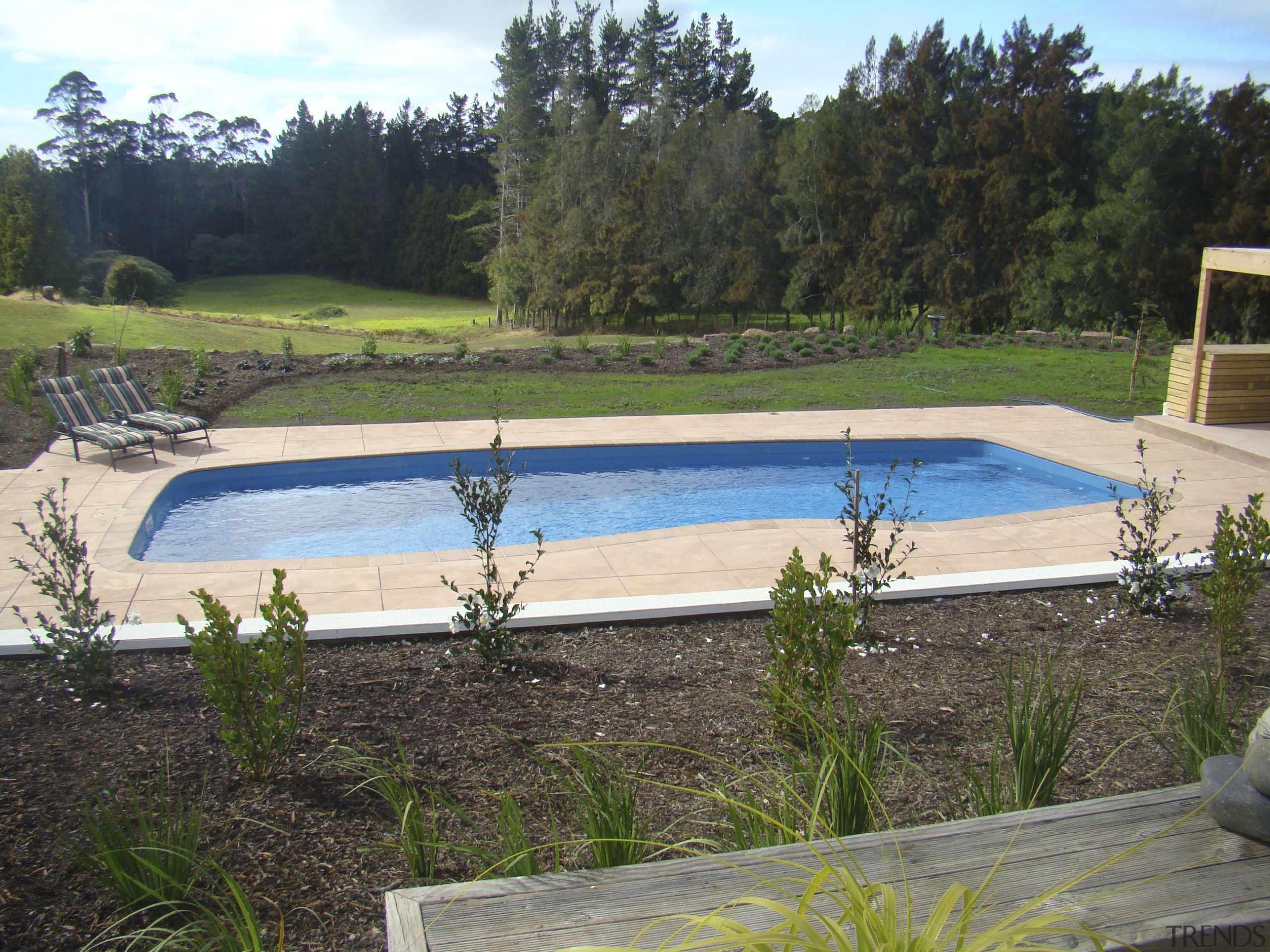 View of pools designed and installed by Barrier backyard, estate, landscape, landscaping, leisure, outdoor structure, property, real estate, swimming pool, water, yard