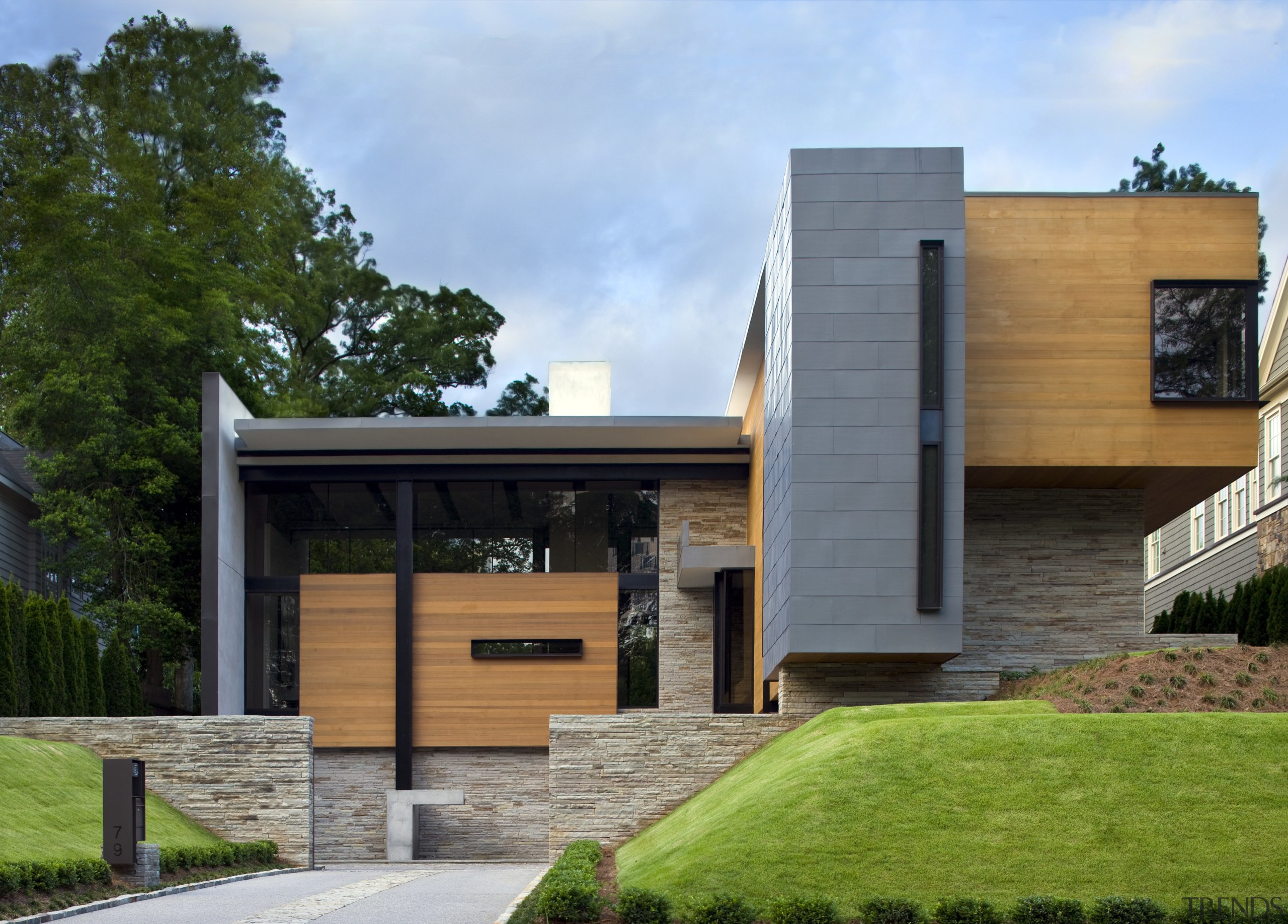 View of the exterior featuring a range of architecture, building, cottage, elevation, facade, home, house, property, real estate, residential area, siding