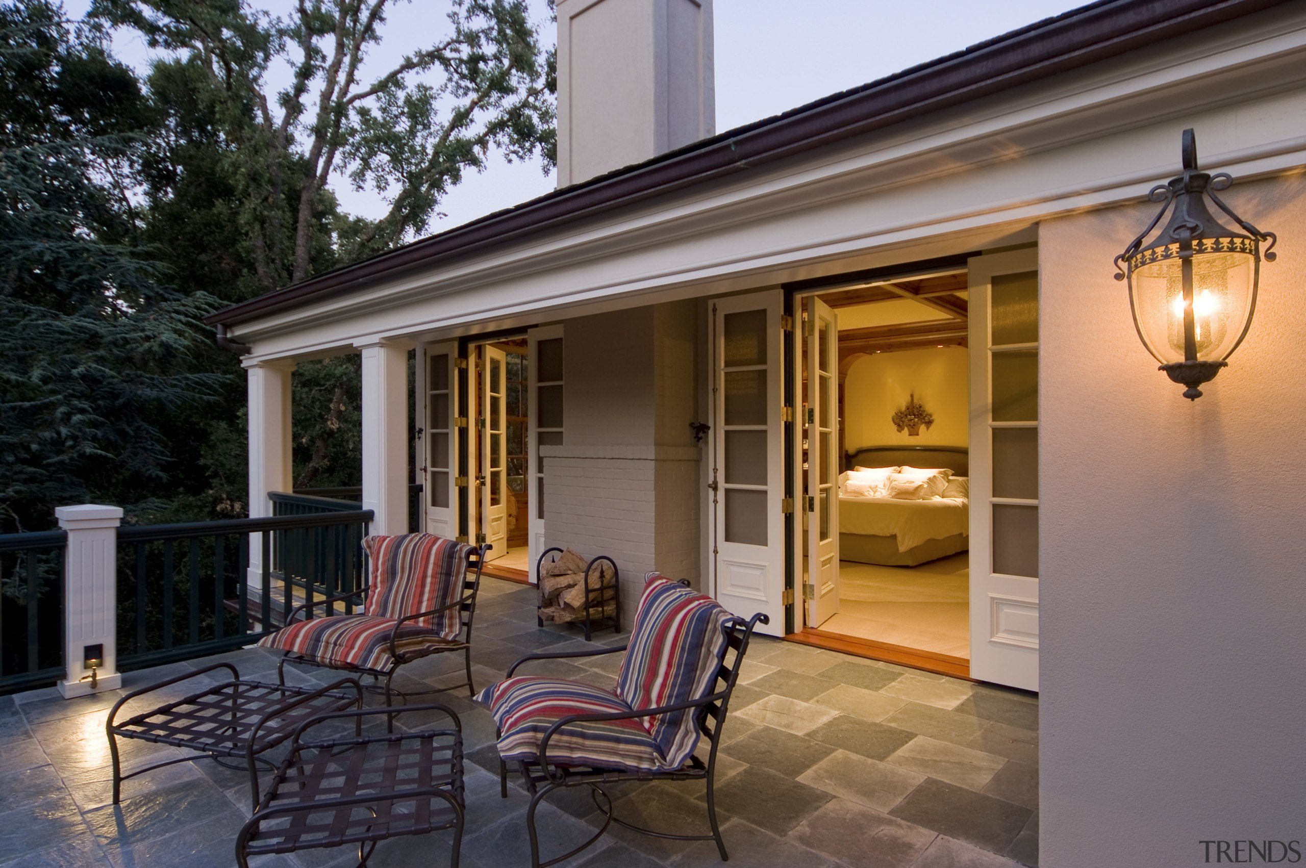 This is a master suite designed by Chuck deck, home, house, interior design, lighting, outdoor structure, patio, porch, property, real estate, window, black