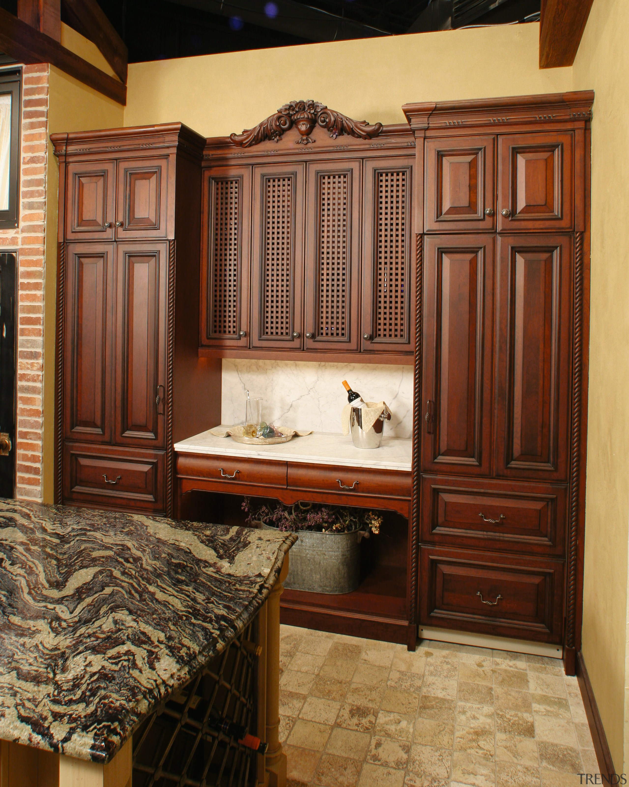 view of this kitchen showing timber cabinetry and cabinetry, countertop, cuisine classique, floor, flooring, furniture, hardwood, interior design, kitchen, room, wood stain, brown, orange