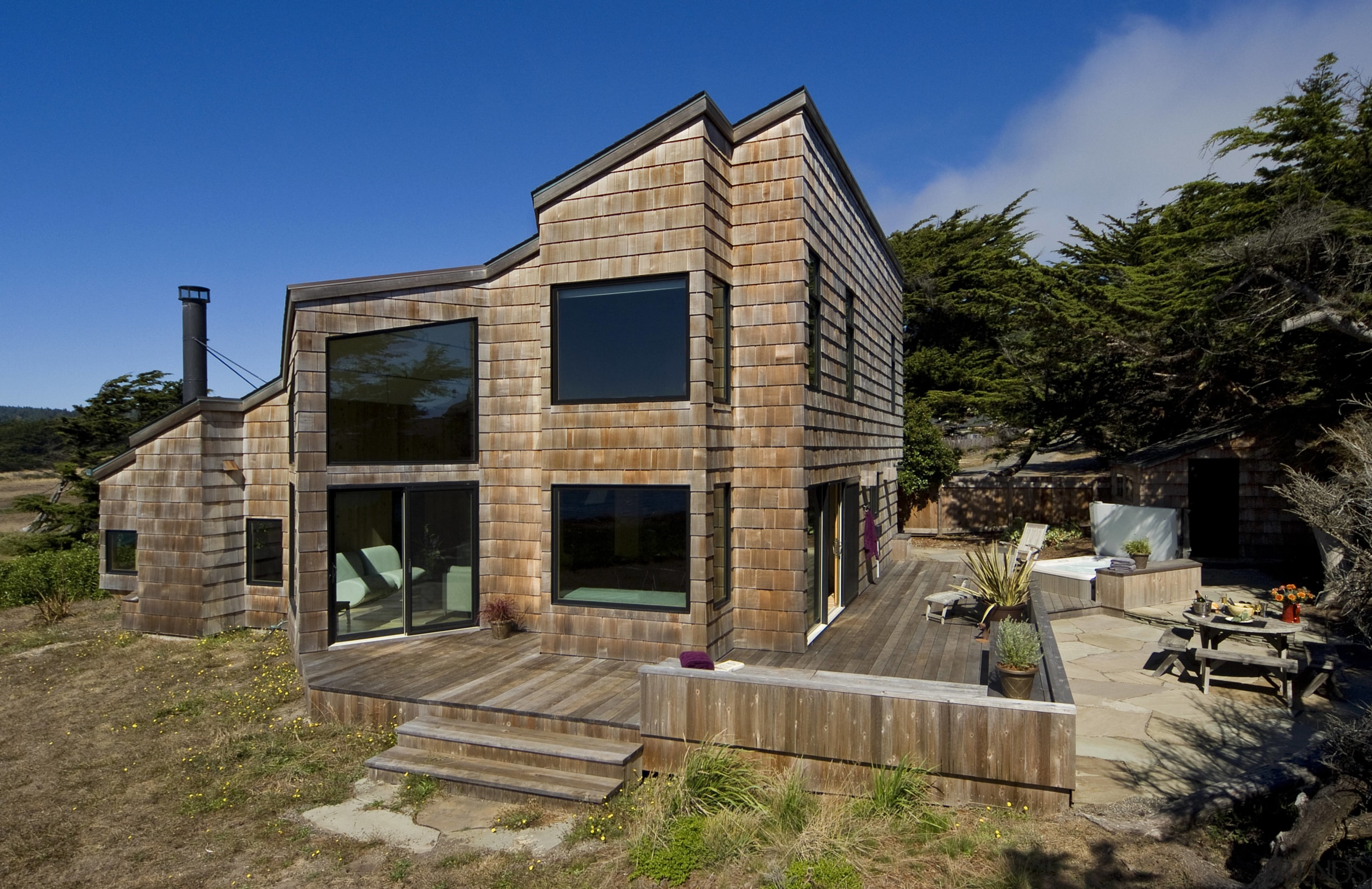 The new exterior of this remodeled seaside house architecture, cottage, facade, home, house, property, real estate, brown