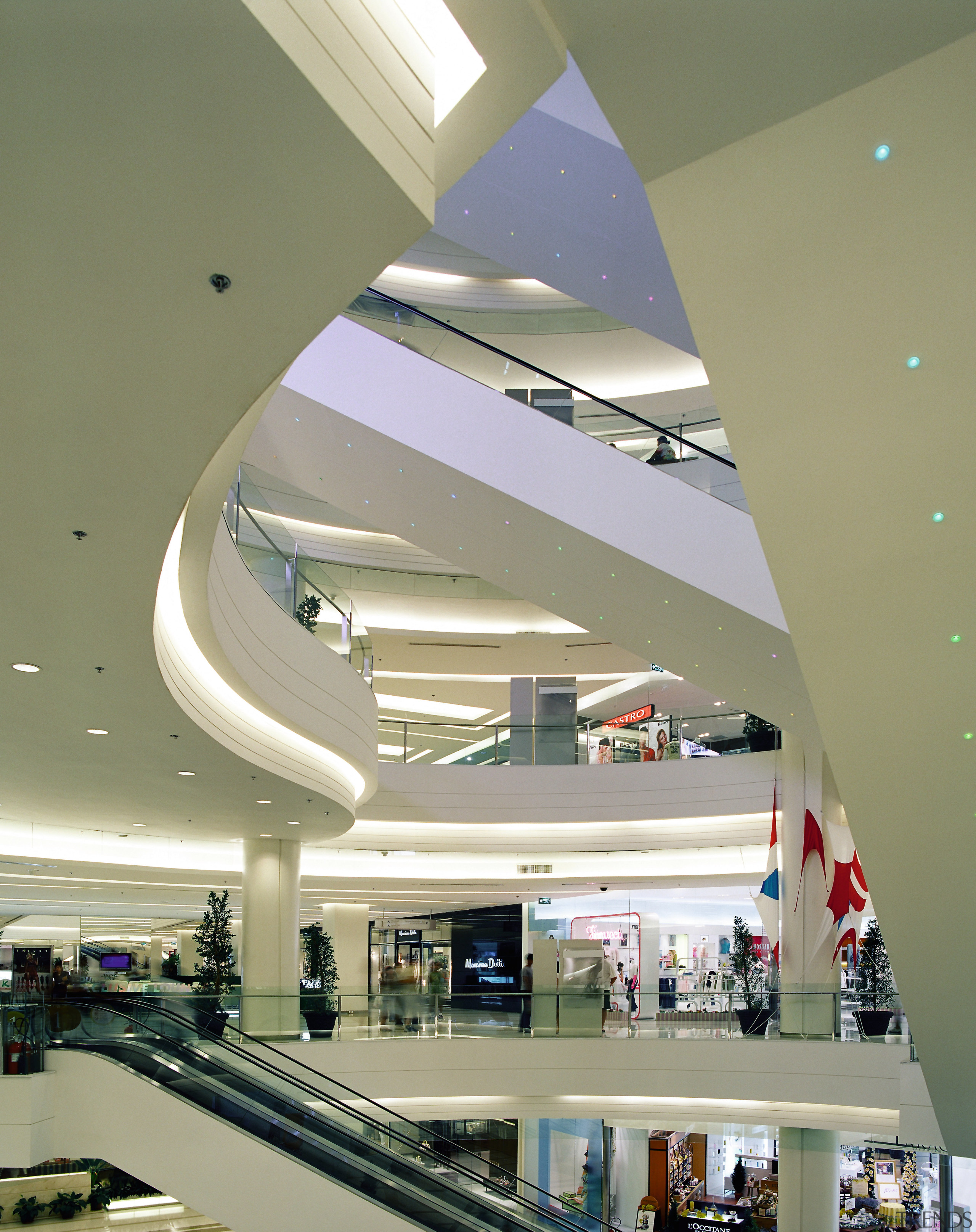 A interior view of the shopping complex. - architecture, ceiling, daylighting, interior design, shopping mall, brown, gray