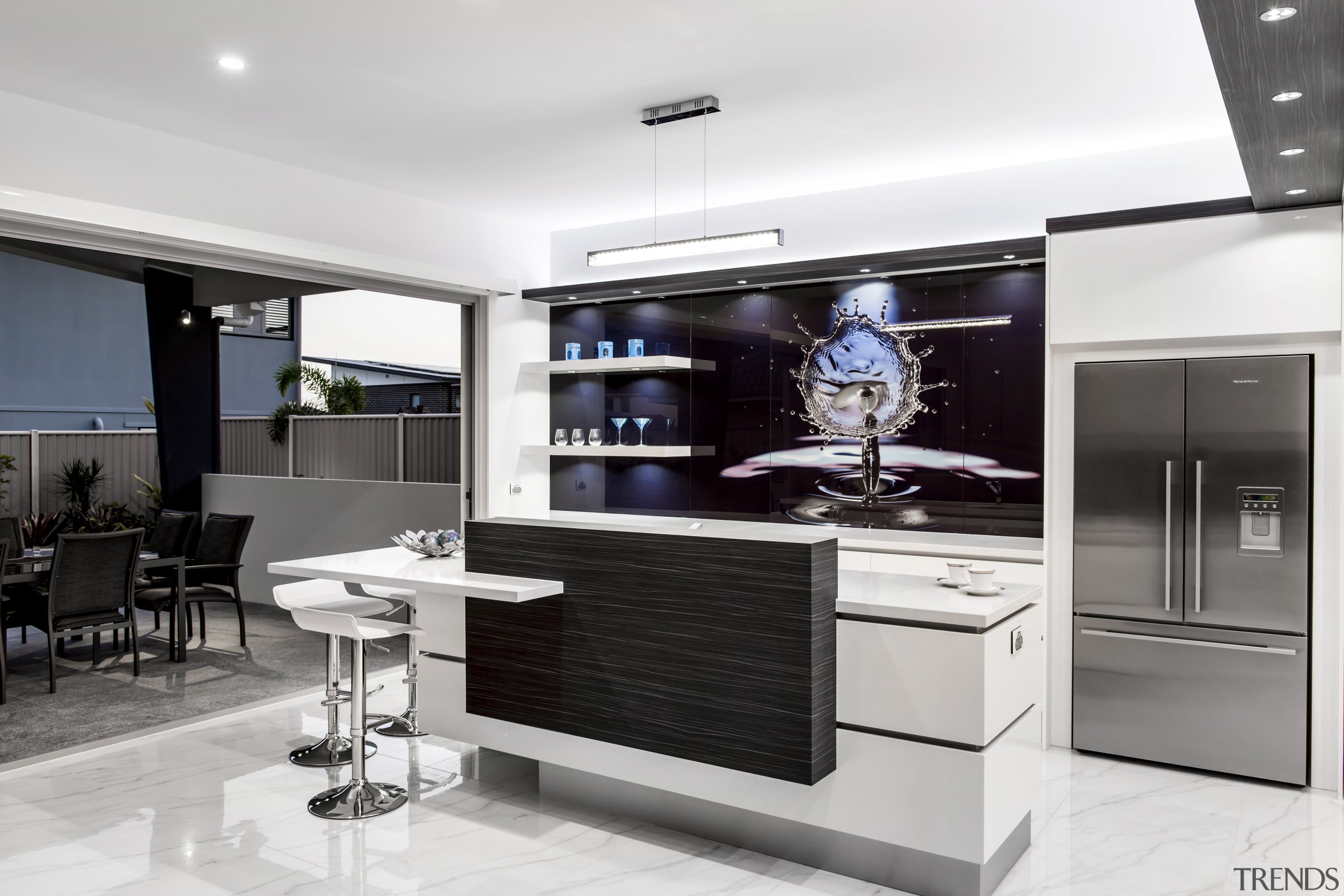 Large sliding doors open up this kitchen to countertop, home appliance, interior design, kitchen, product design, white